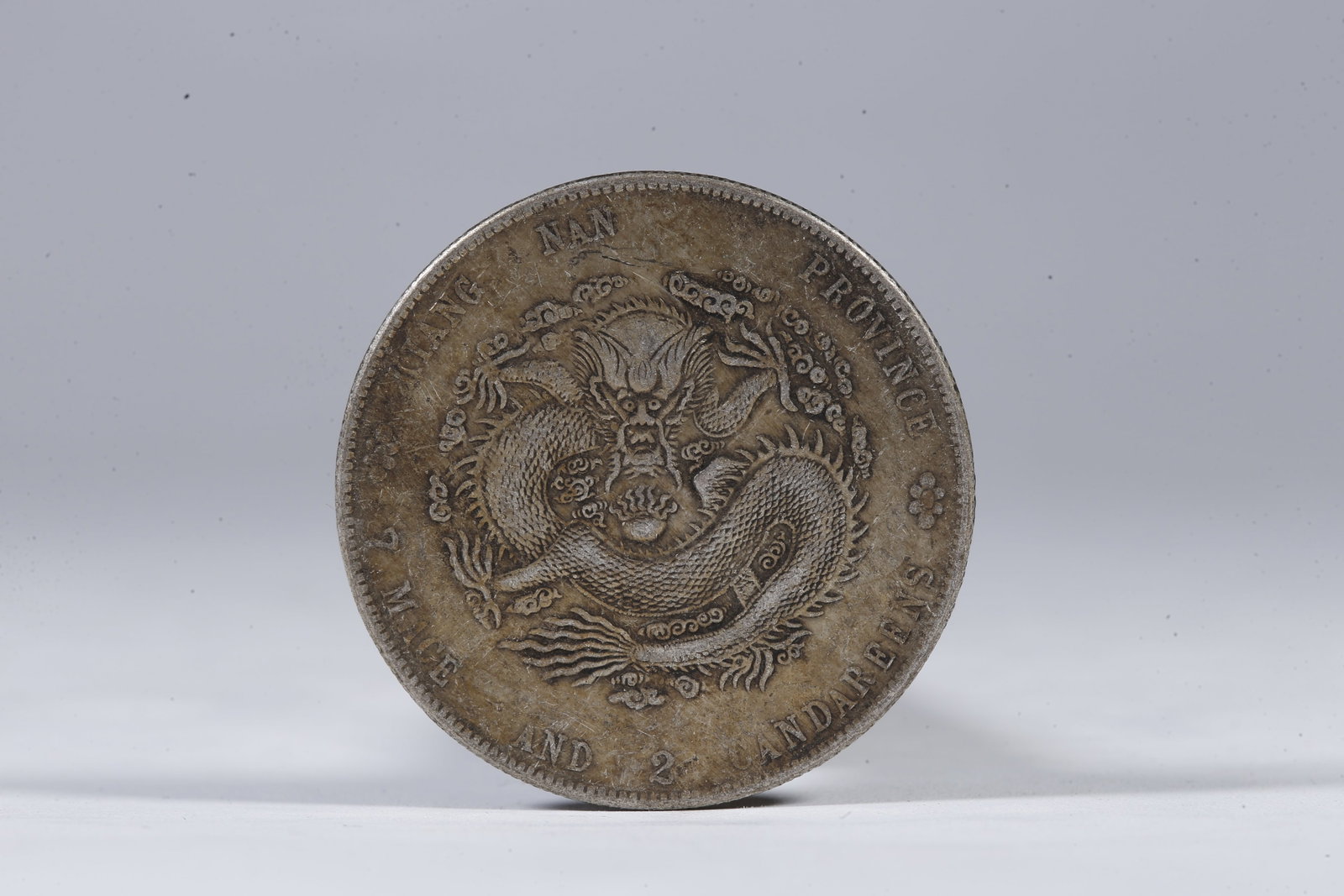A SILVER DOLLAR COIN - 3