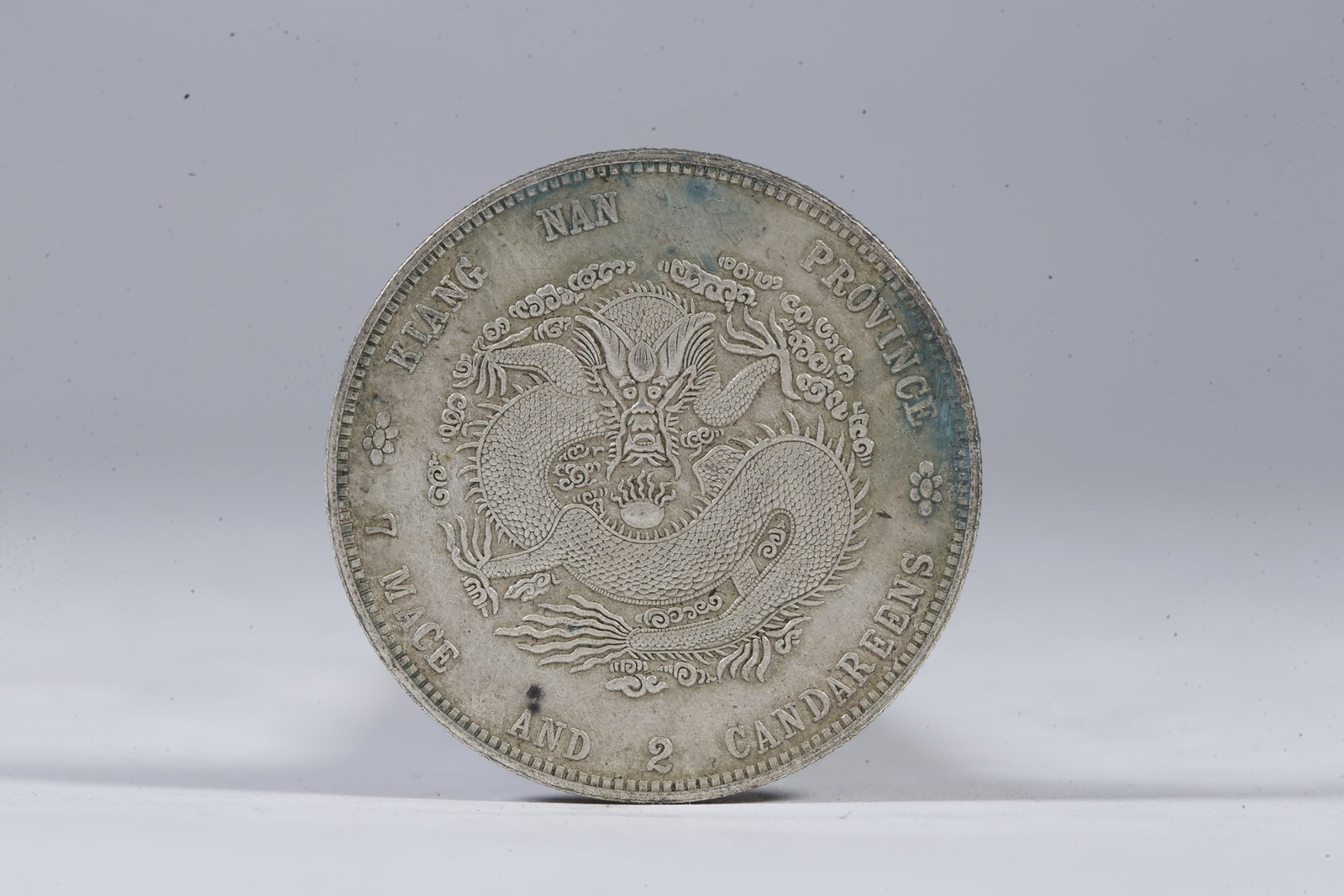 A SILVER DOLLAR COIN - 3