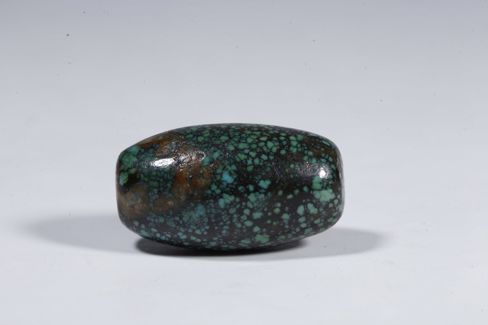 A TURQUOISE BEAD - 2