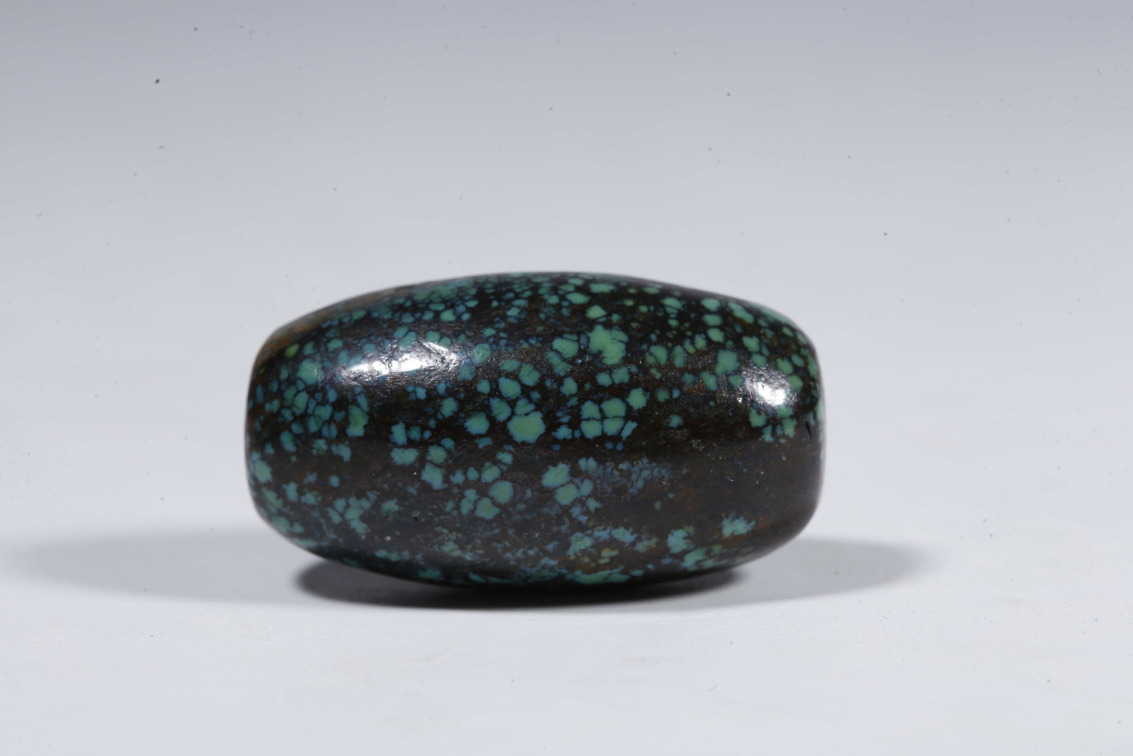 A TURQUOISE BEAD - 3