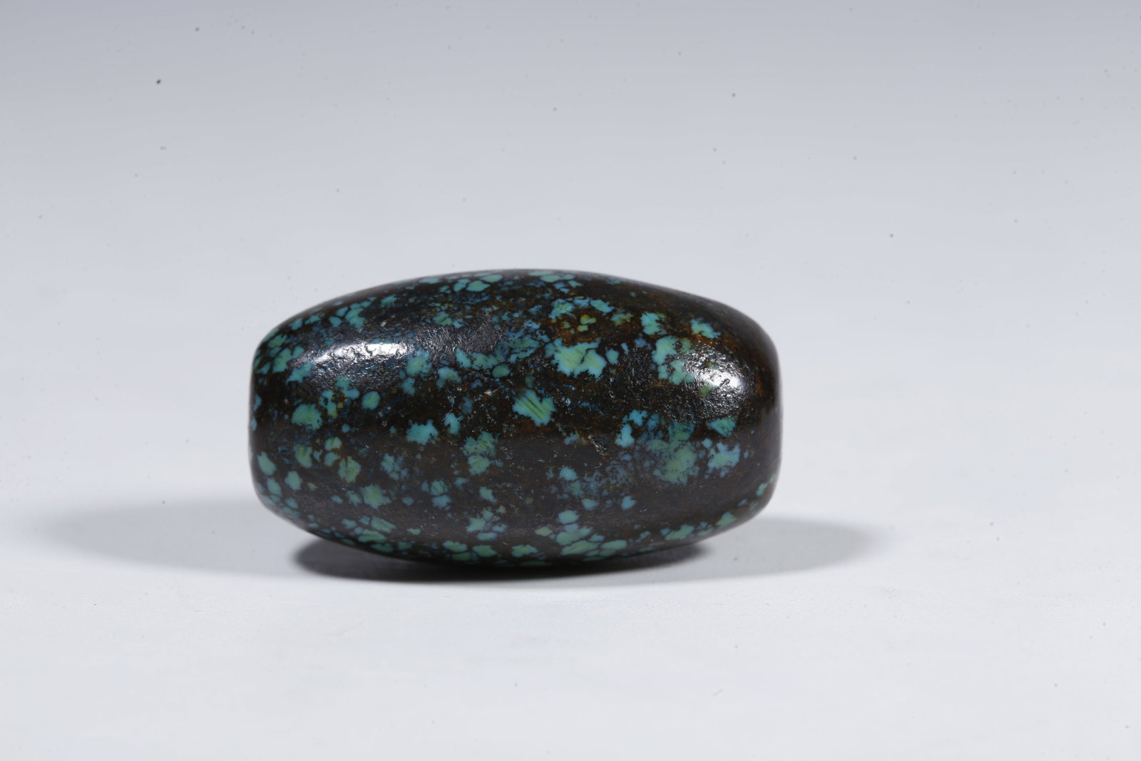 A TURQUOISE BEAD - 4