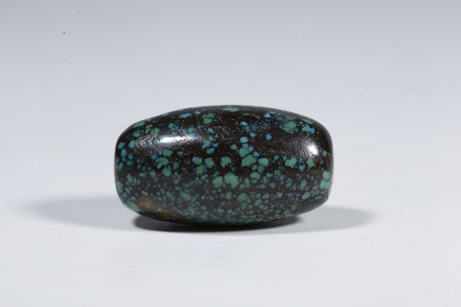 A TURQUOISE BEAD - 5