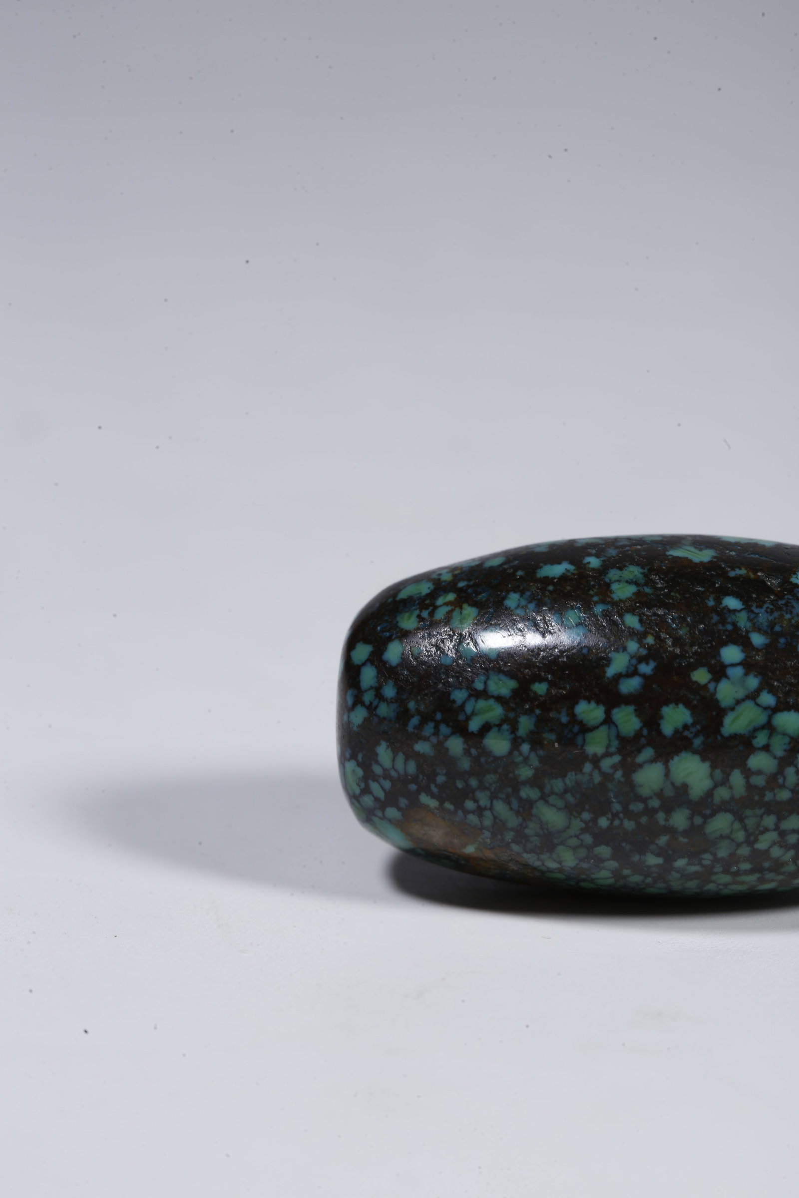 A TURQUOISE BEAD - 7