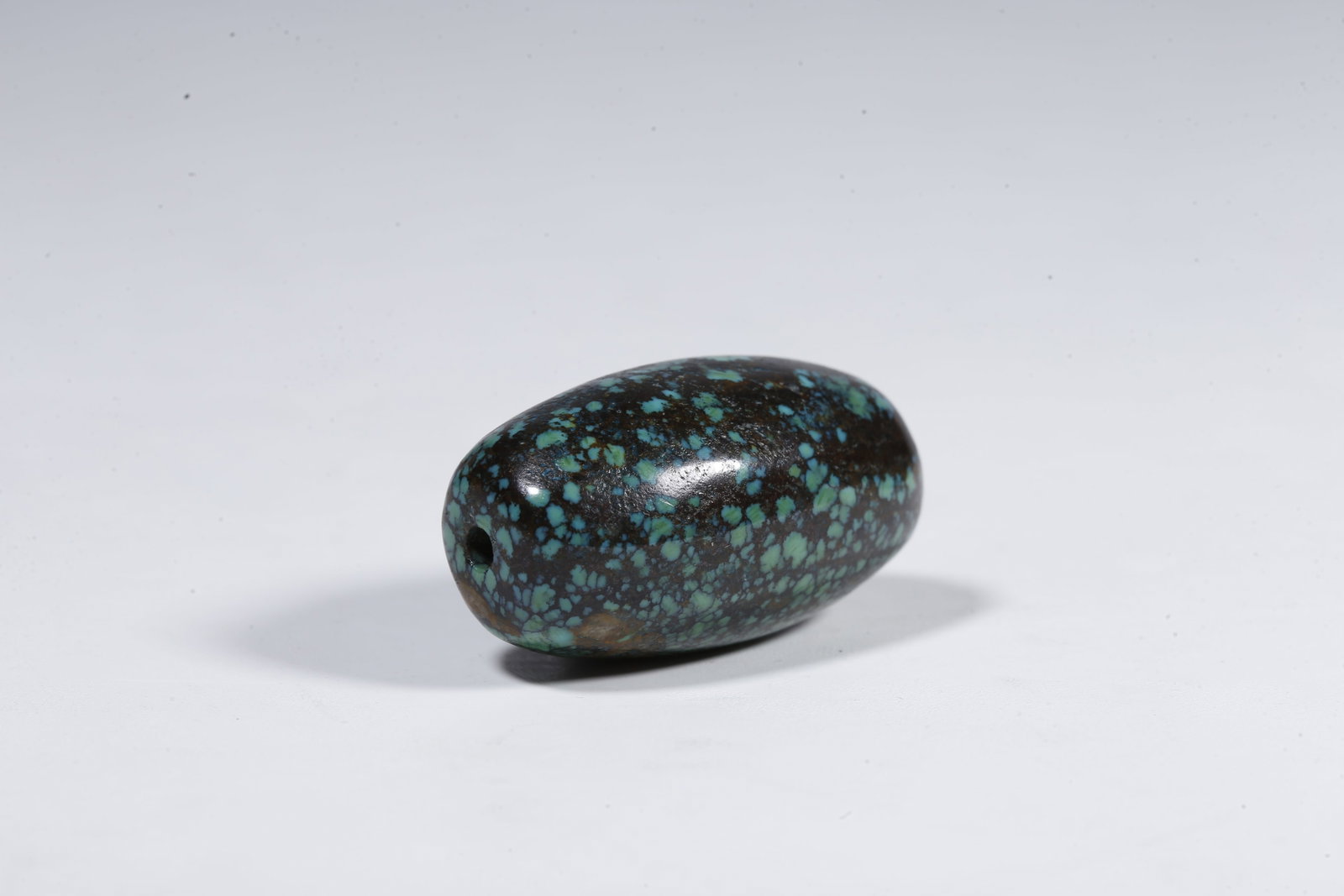 A TURQUOISE BEAD - 8