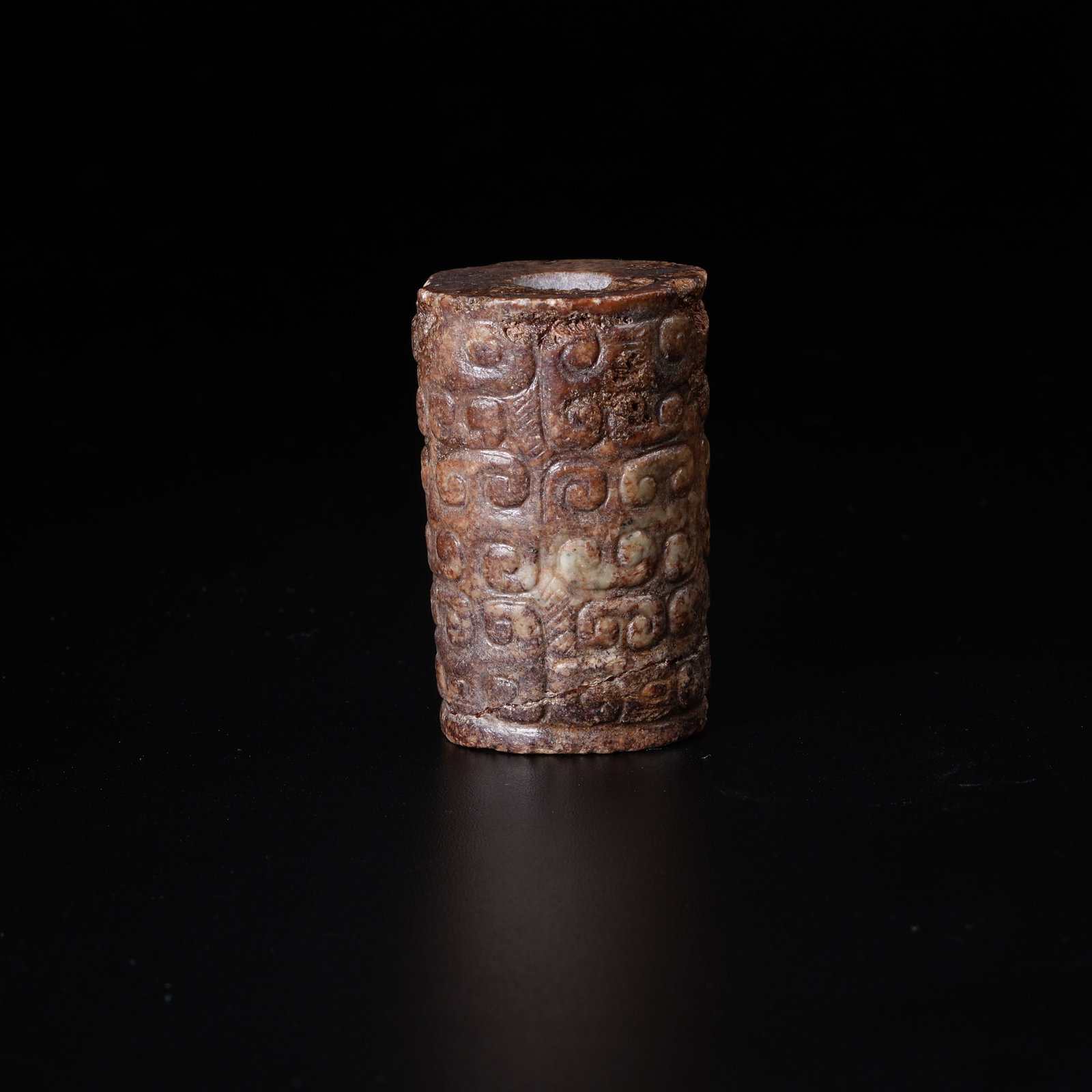 A ANCIENT JADE TUBE PENDANT WITH HOOKED CLOUD PATTERN: Ancient Jade Tube Pendant with Hooked Cloud Pattern
