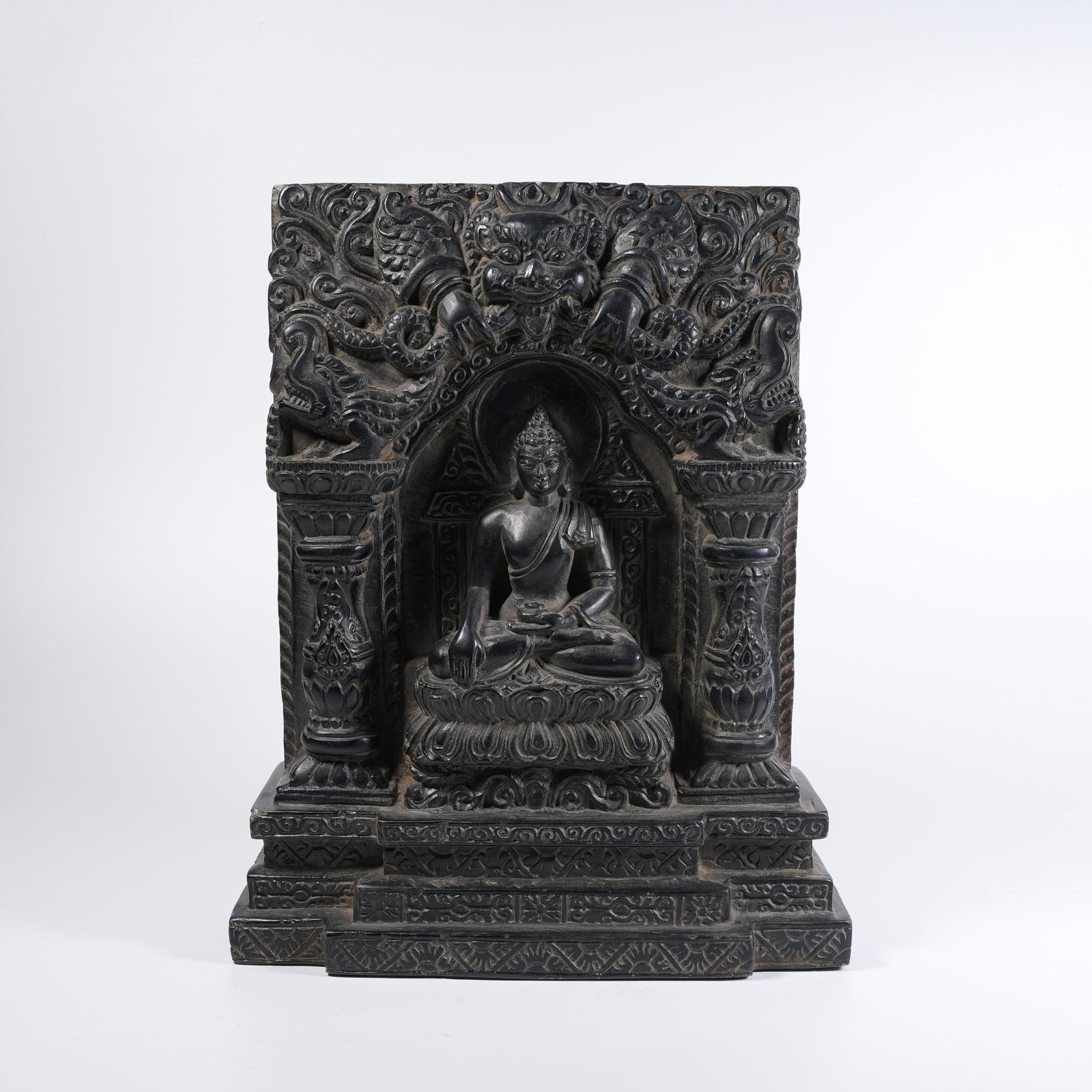 A BLACK STONE PANEL CARVED WITH SAKYAMUNI BUDDHA (1 of 8)