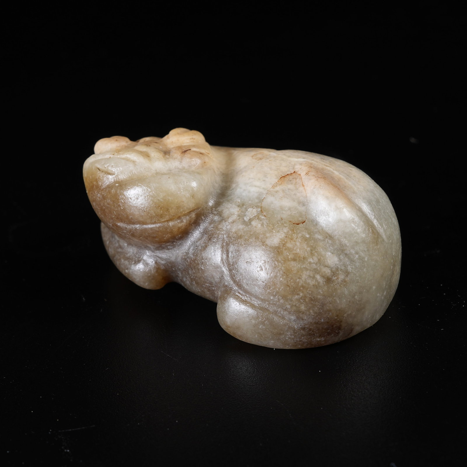 A ANCIENT JADE RECUMBENT BEAST ORNAMENT: Ancient Jade Recumbent Beast Ornament