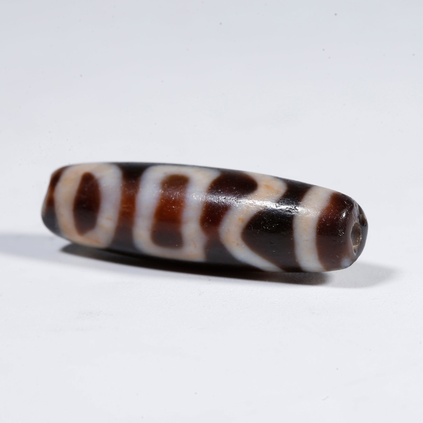 A ONE-EYED DZI BEAD (1 of 9)