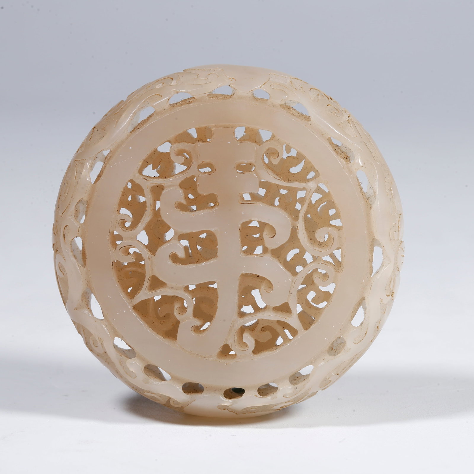 A HETIAN JADE PENDANT CARVED WITH BLESSING-AND-LONGEVITY PATTERN: Hetian jade pendant carved with blessing-and-longevity pattern