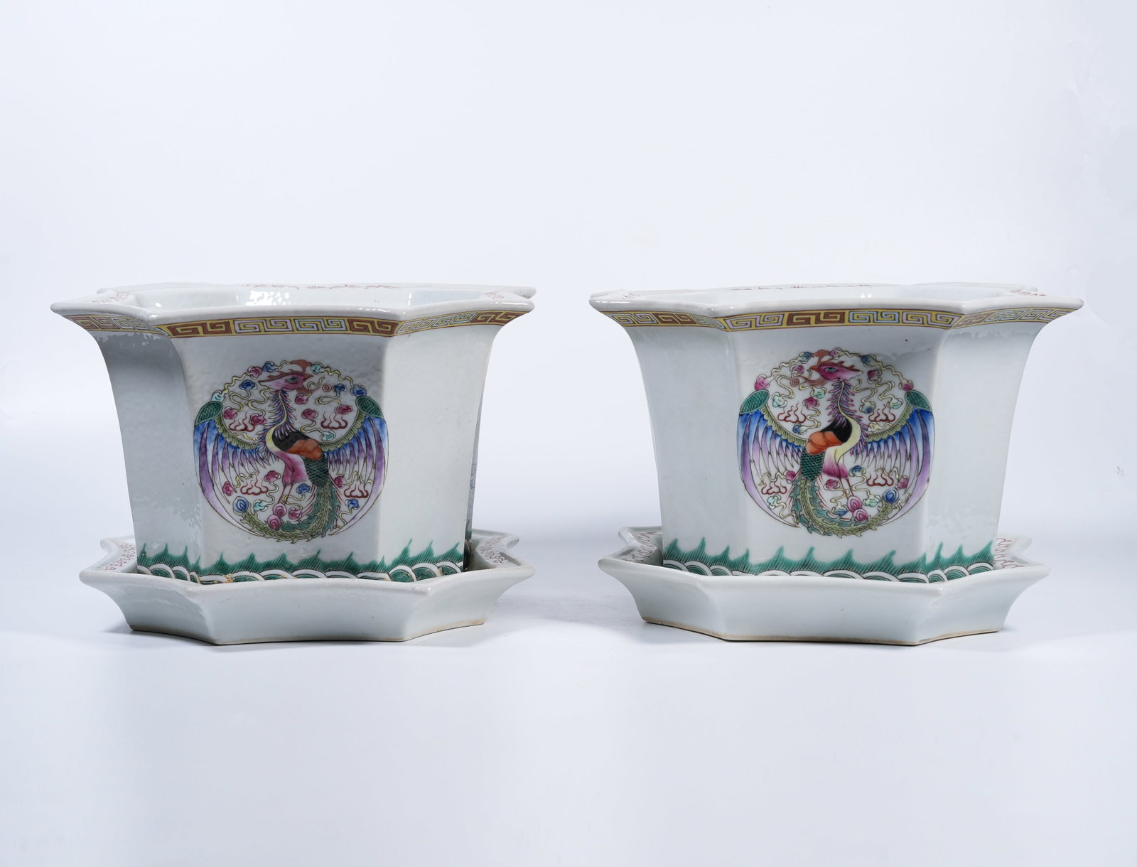 A GROUP OF FAMILLE-ROSE FLOWER POTS WITH DRAGON-PHOENIX PATTERN: Group of famille-rose flower pots with dragon-phoenix pattern