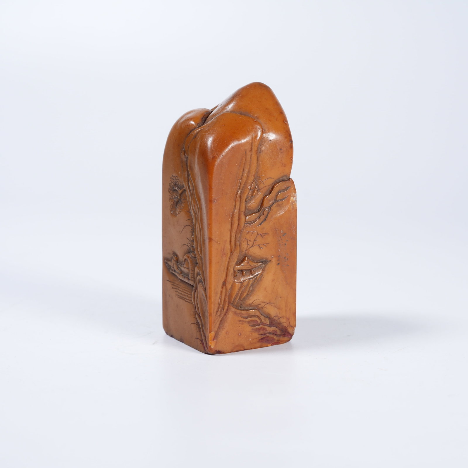 A SHOUSHAN STONE SEAL WITH LANDSCAPE PATTERN: Shoushan stone seal with landscape pattern