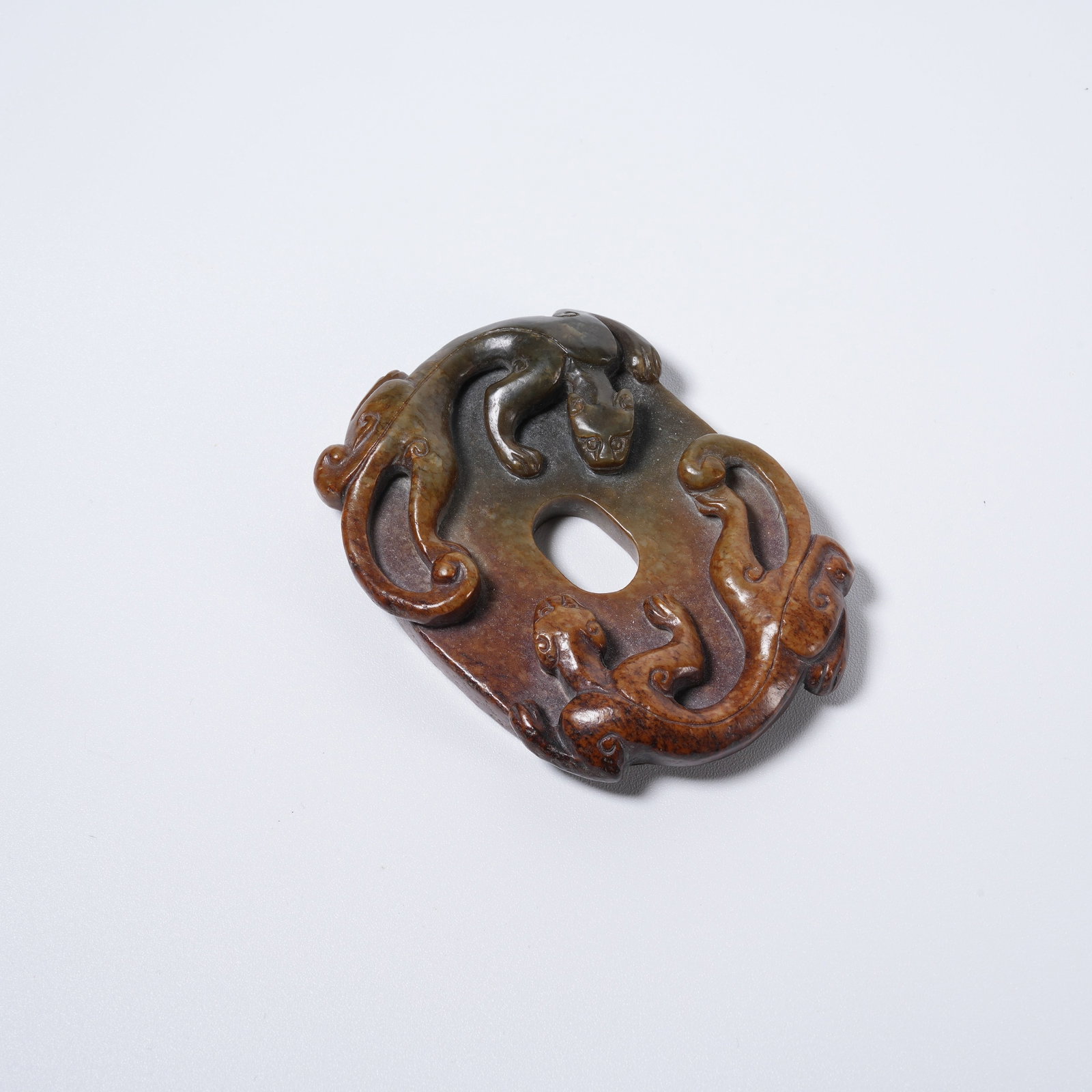 A HETIAN JADE BI DISC WITH CHILONG DRAGON PATTERN (1 of 8)