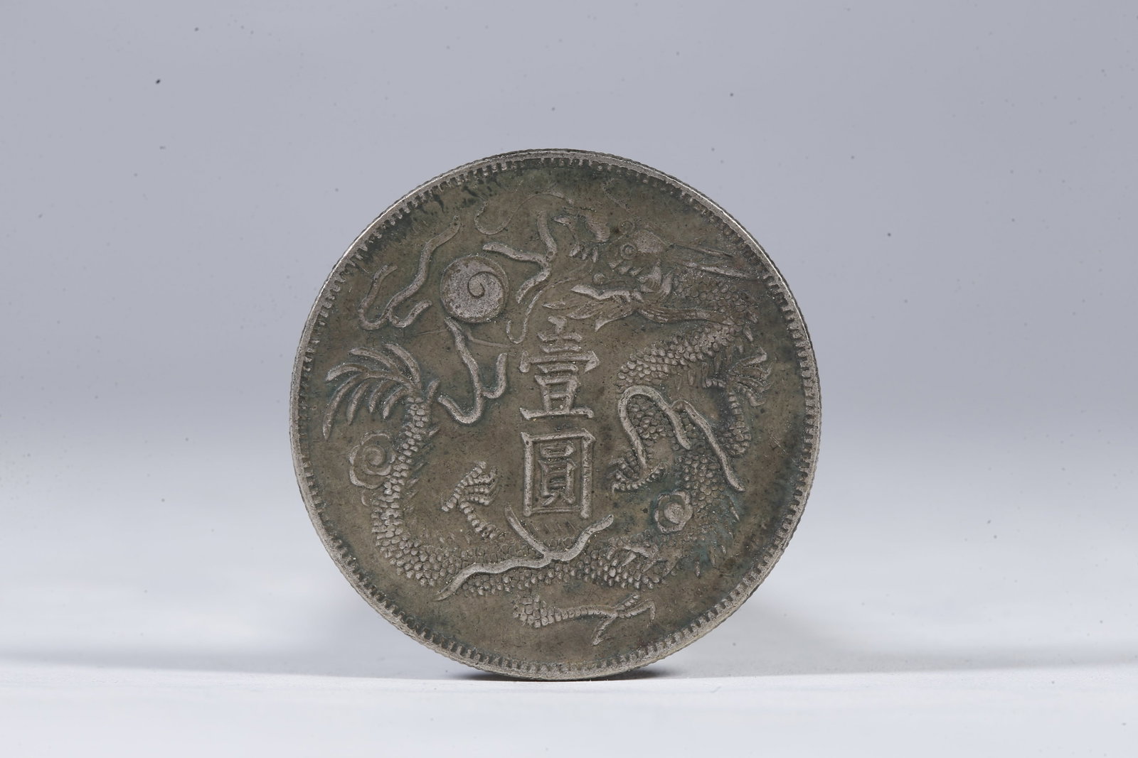 A SILVER DOLLAR COIN - 3
