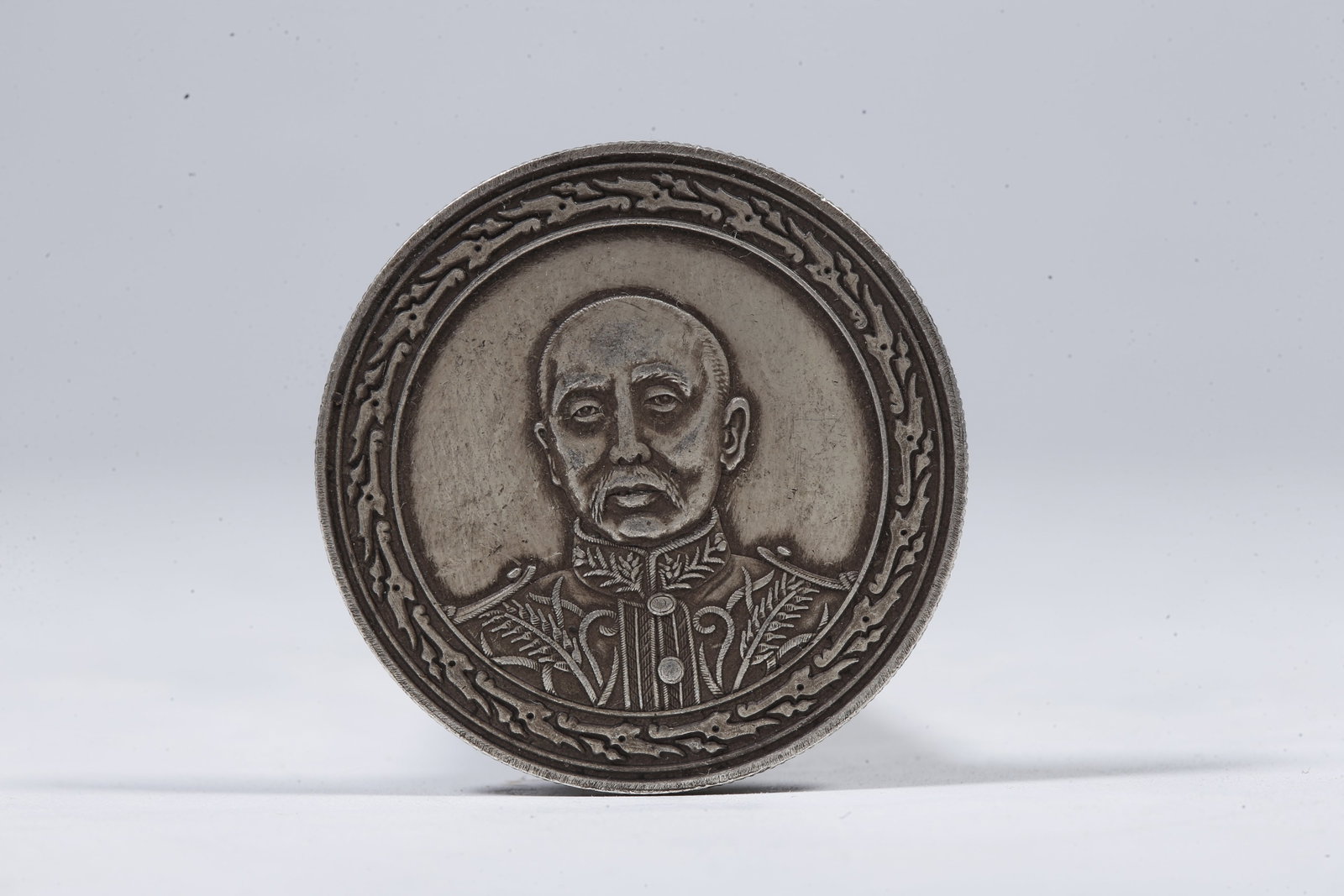 A SILVER DOLLAR COIN - 3