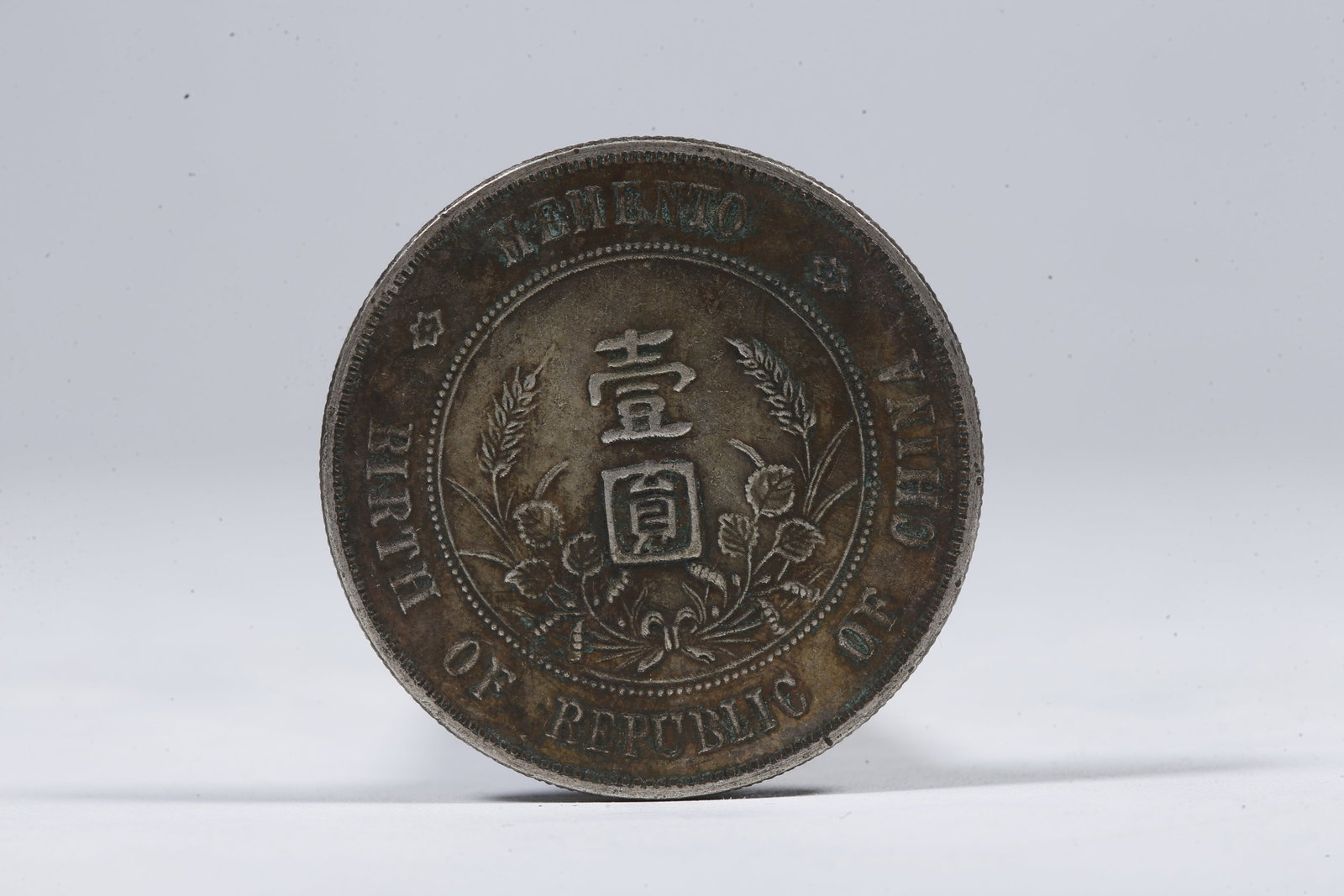 A SILVER DOLLAR COIN - 3
