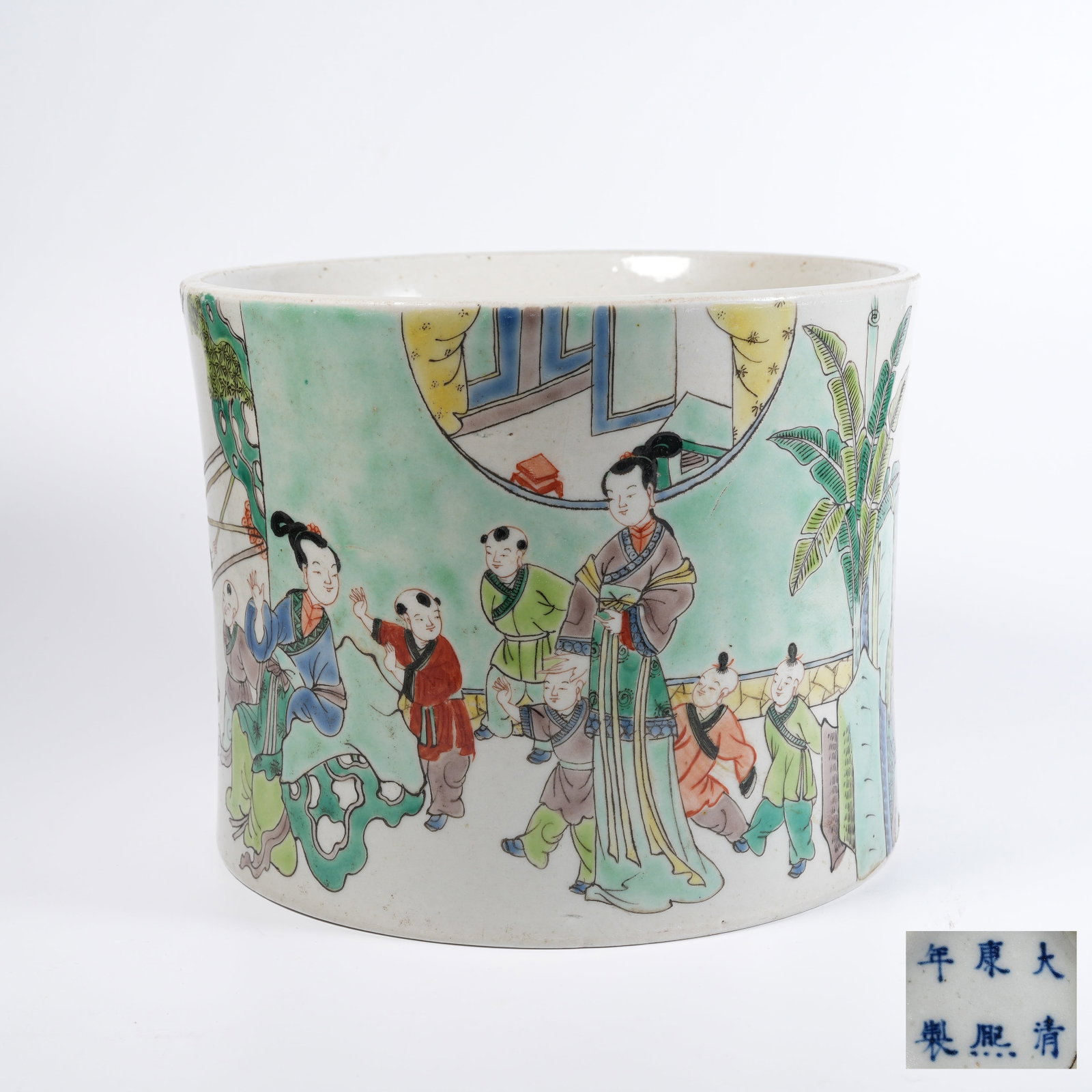 A WUCAI BRUSH POT WITH BOYS-AT-PLAY MOTIF: Wucai brush pot with boys-at-play motif