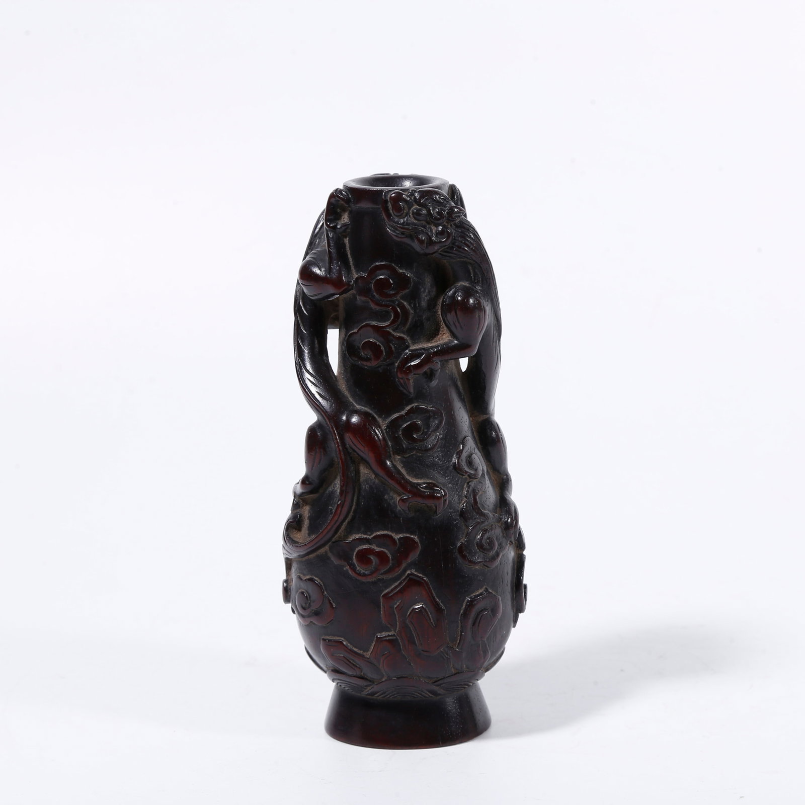 A RED SANDALWOOD CARVED CLOUD-DRAGON PATTERN INCENSE HOLDER: Red sandalwood carved cloud-dragon pattern incense holder