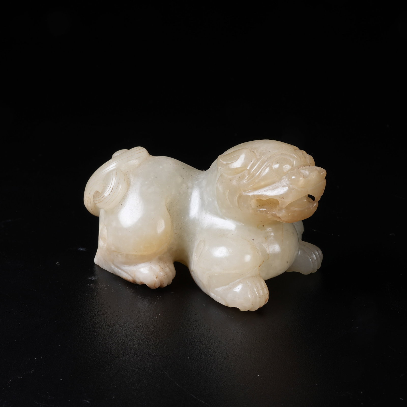 A ARCHAIC JADE RECUMBENT BEAST ORNAMENT: Archaic Jade Recumbent Beast Ornament