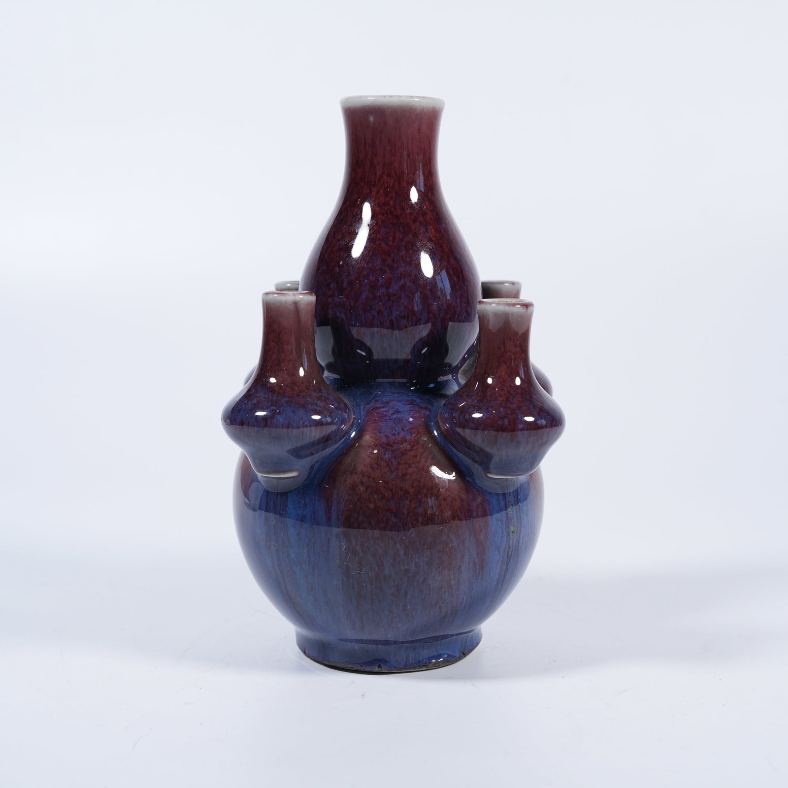 A FLAMBE-GLAZE FIVE-HOLE GOURD-SHAPED VASE (1 of 9)