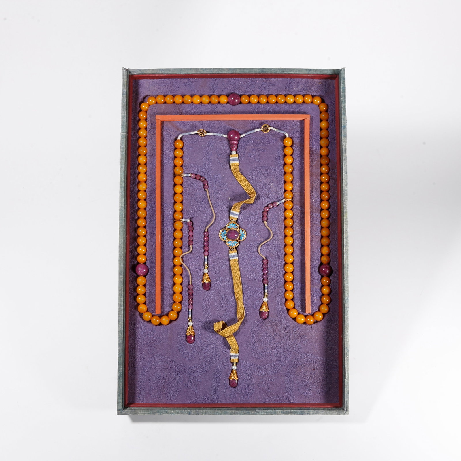 A STRAND OF AMBER COURT BEADS (1 of 12)