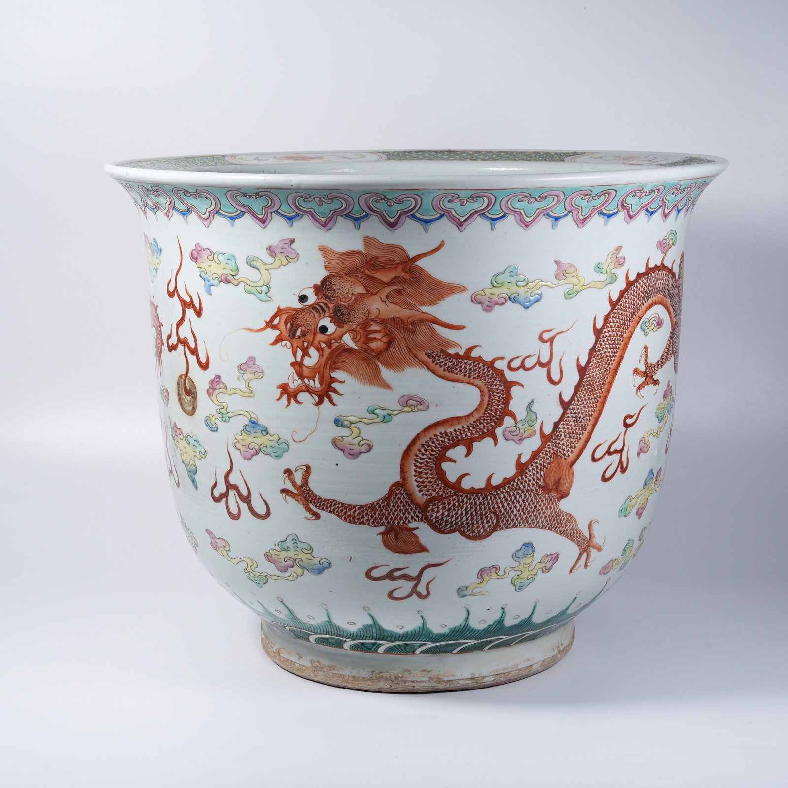 A LARGE FAMILLE-ROSE FLOWER POT WITH CLOUD-AND-DRAGON PATTERN (1 of 9)