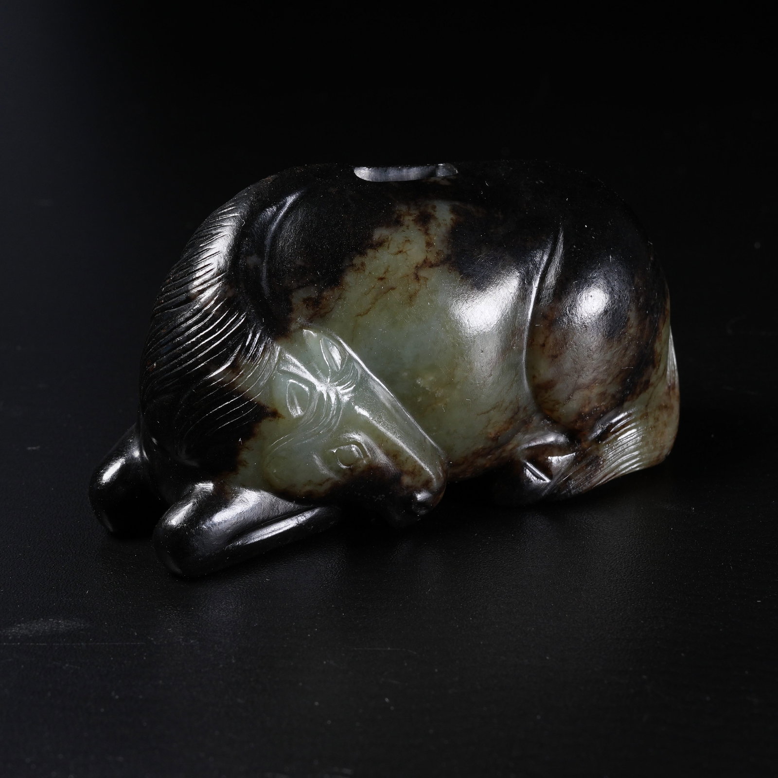 A HETIAN JADE RECUMBENT HORSE PENDANT (1 of 8)