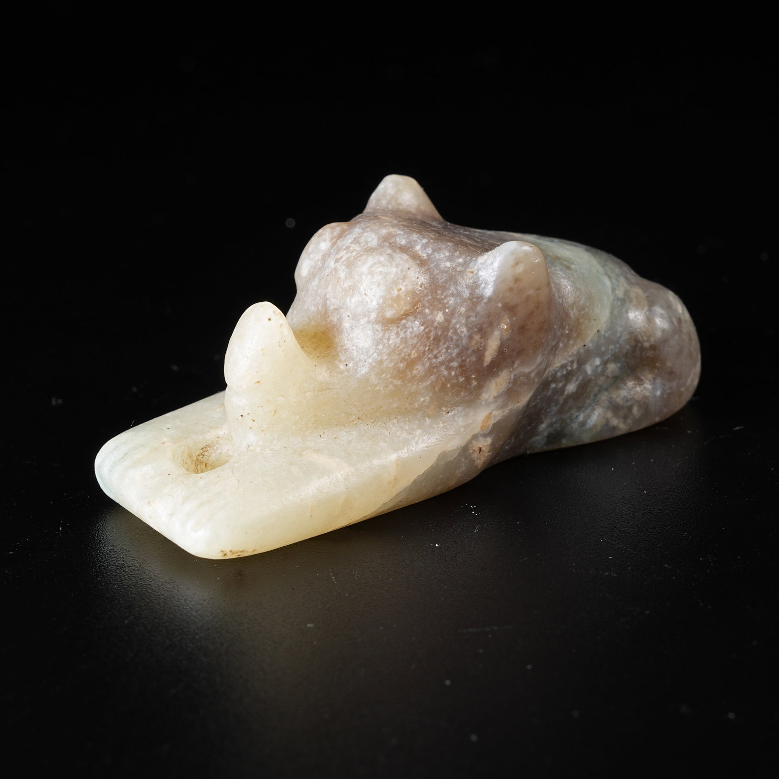 A ANCIENT JADE RECUMBENT BEAST PENDANT: Ancient Jade Recumbent Beast Pendant
