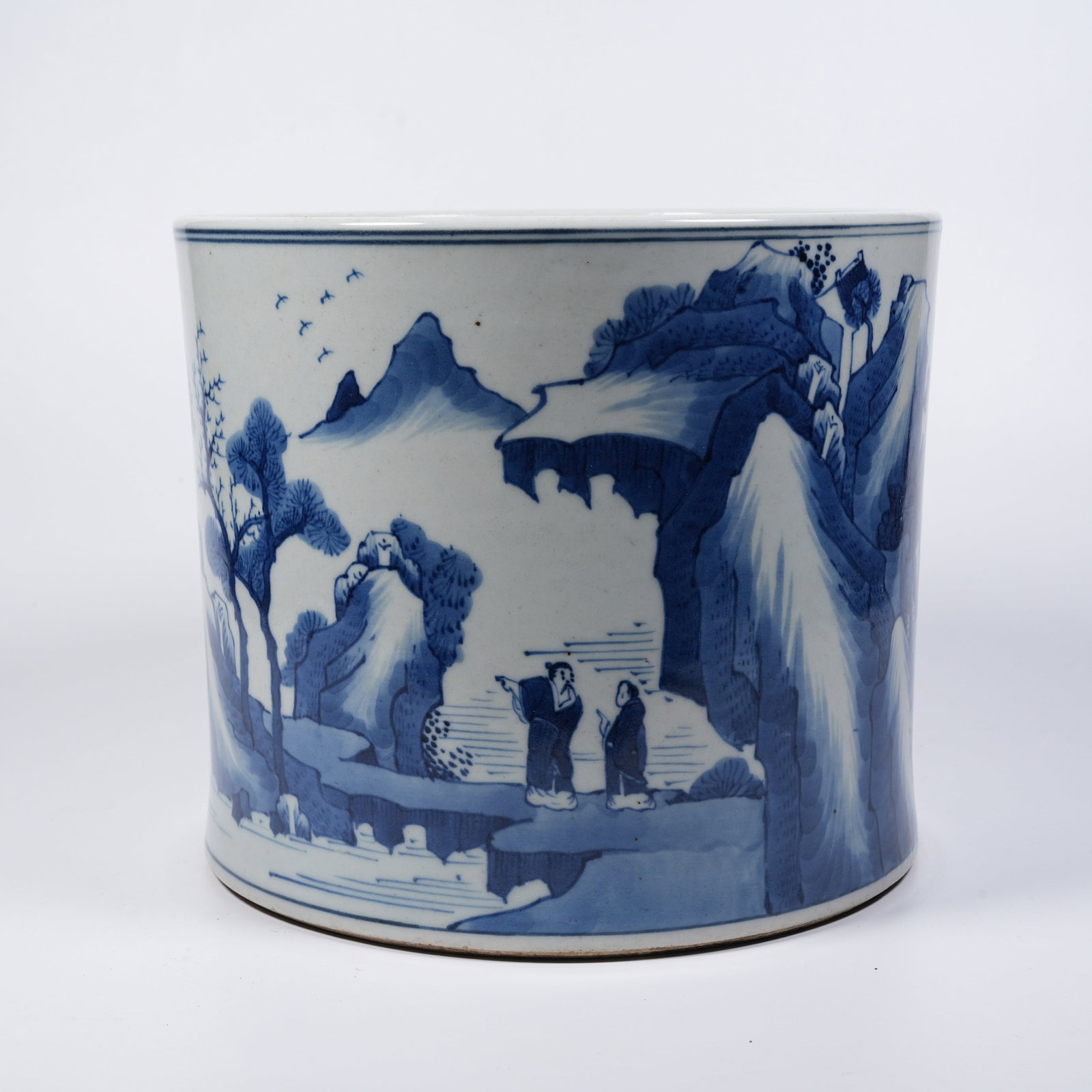 A BLUE-AND-WHITE BRUSH POT WITH LANDSCAPE AND FIGURE PATTERN (1 of 9)