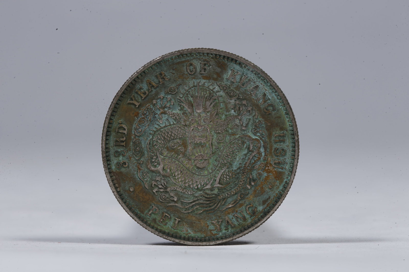 A SILVER DOLLAR COIN - 3