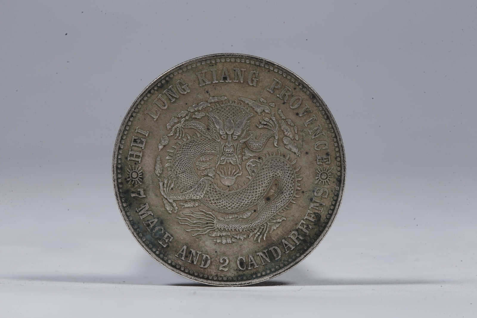 A SILVER DOLLAR COIN - 3