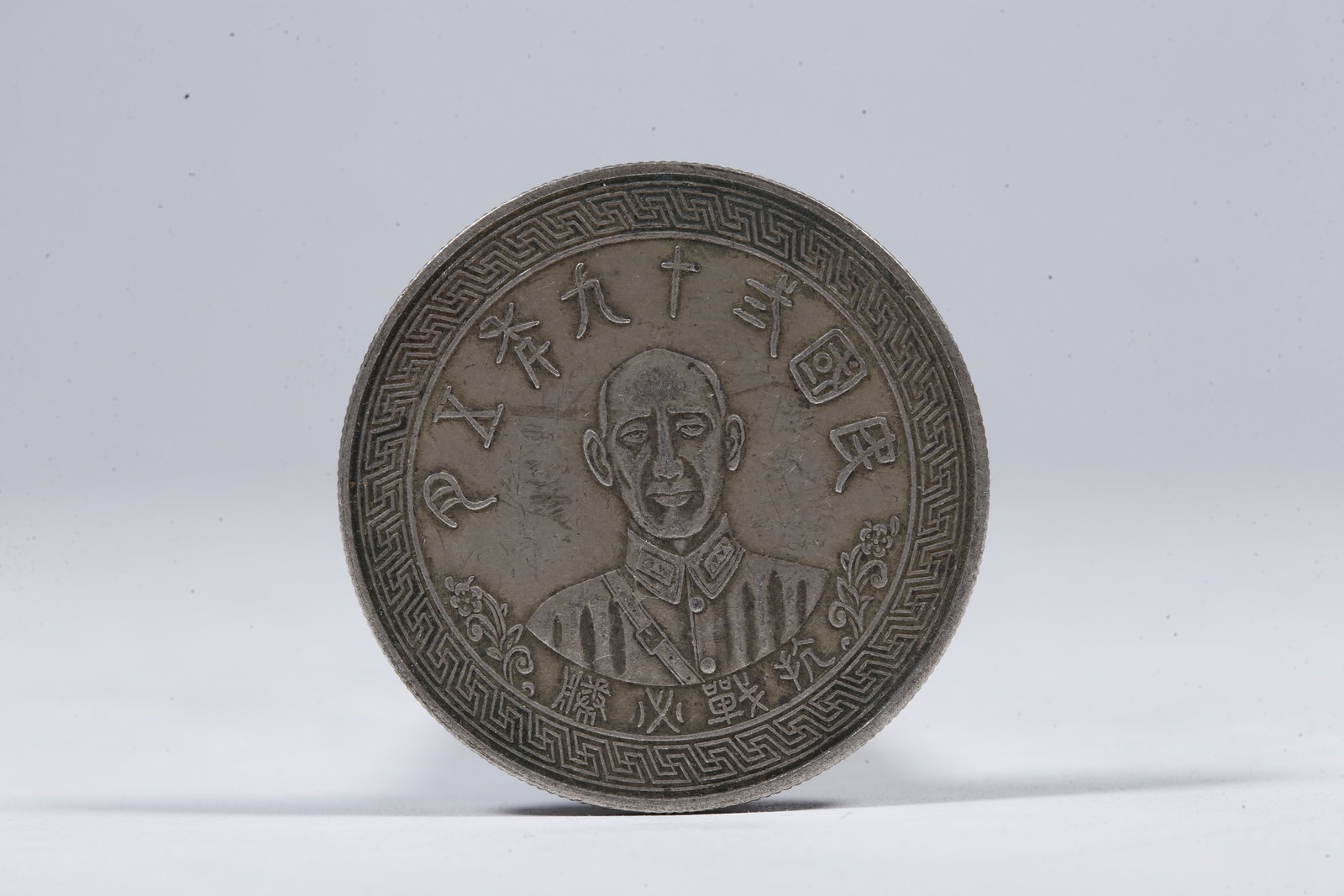 A SILVER DOLLAR COIN - 3