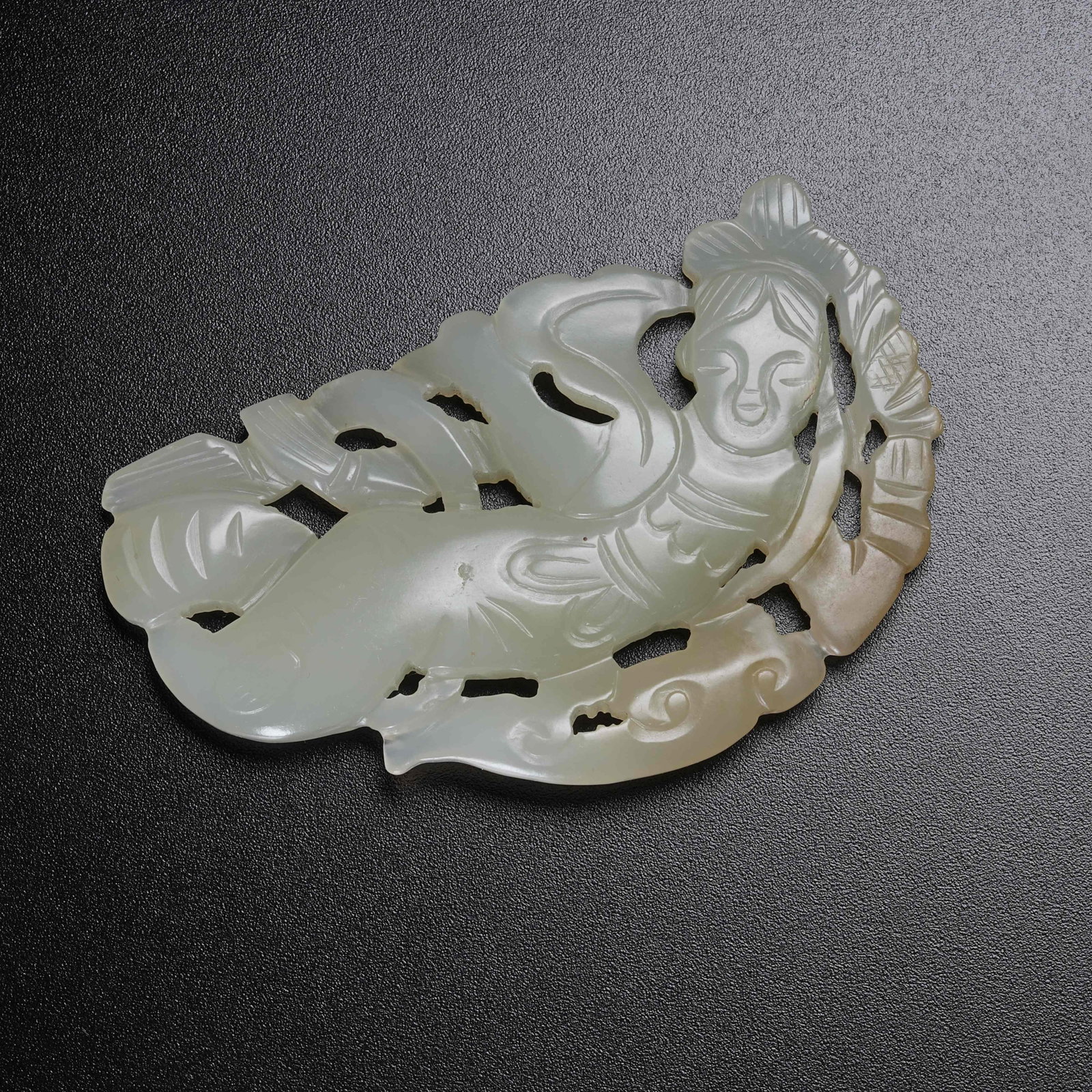 A HETIAN JADE FLYING APSARAS PENDANT: Hetian Jade Flying Apsaras Pendant