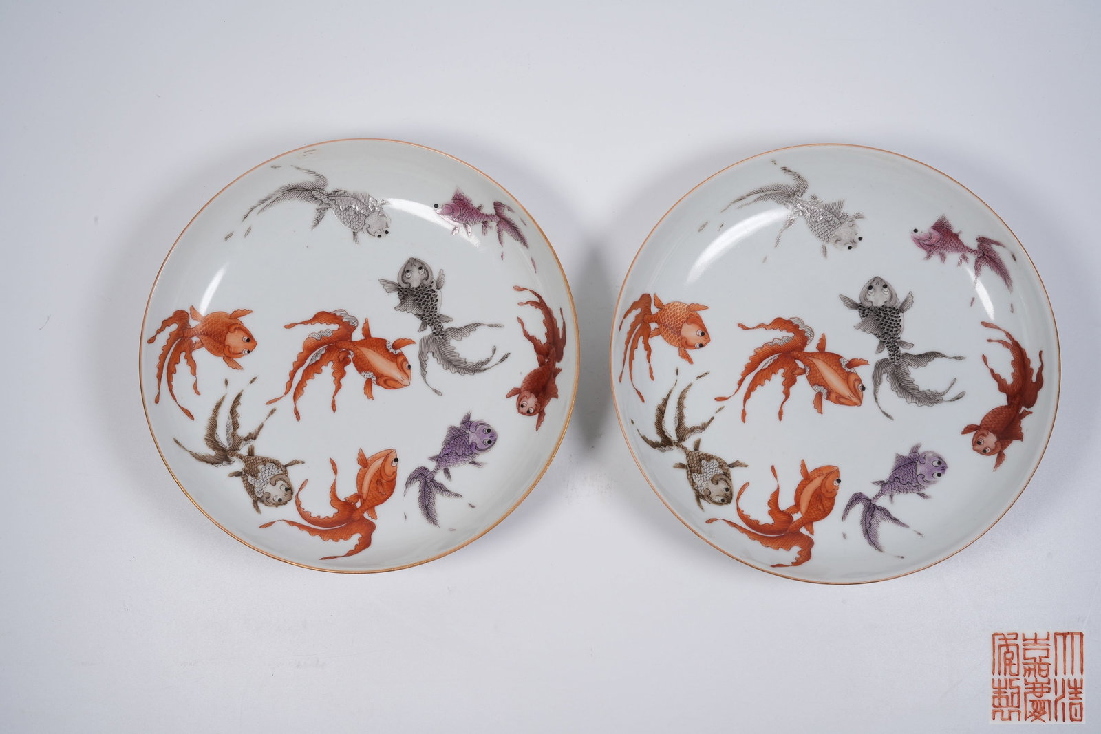 A SET OF FAMILLE-ROSE FISH-PATTERN PLATES: Set of famille-rose fish-pattern plates