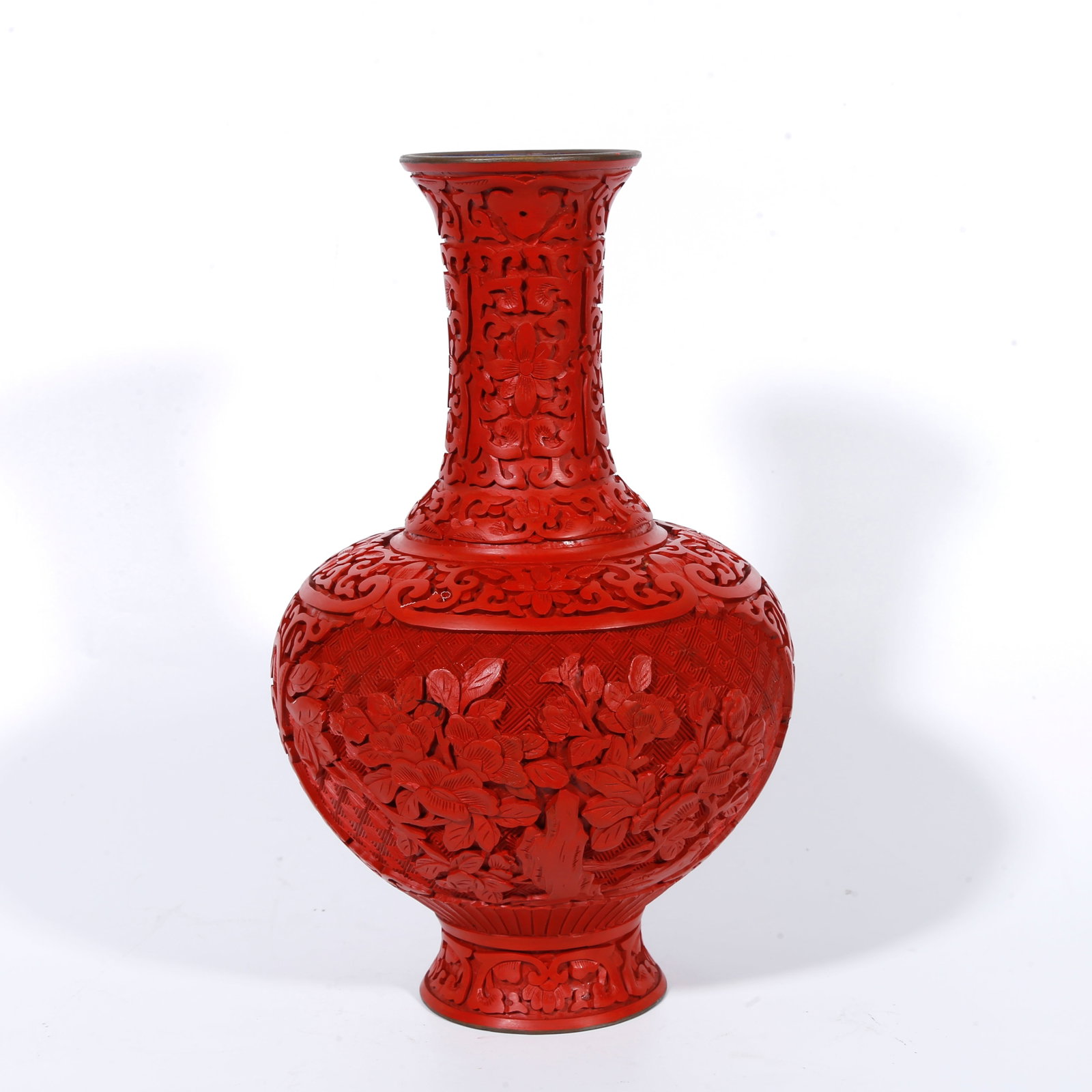 A BRONZE-BODY CARVED-RED APPRECIATION VASE WITH ROCK-AND-FLOWER PATTERN: Bronze-body carved-red appreciation vase with rock-and-flower pattern