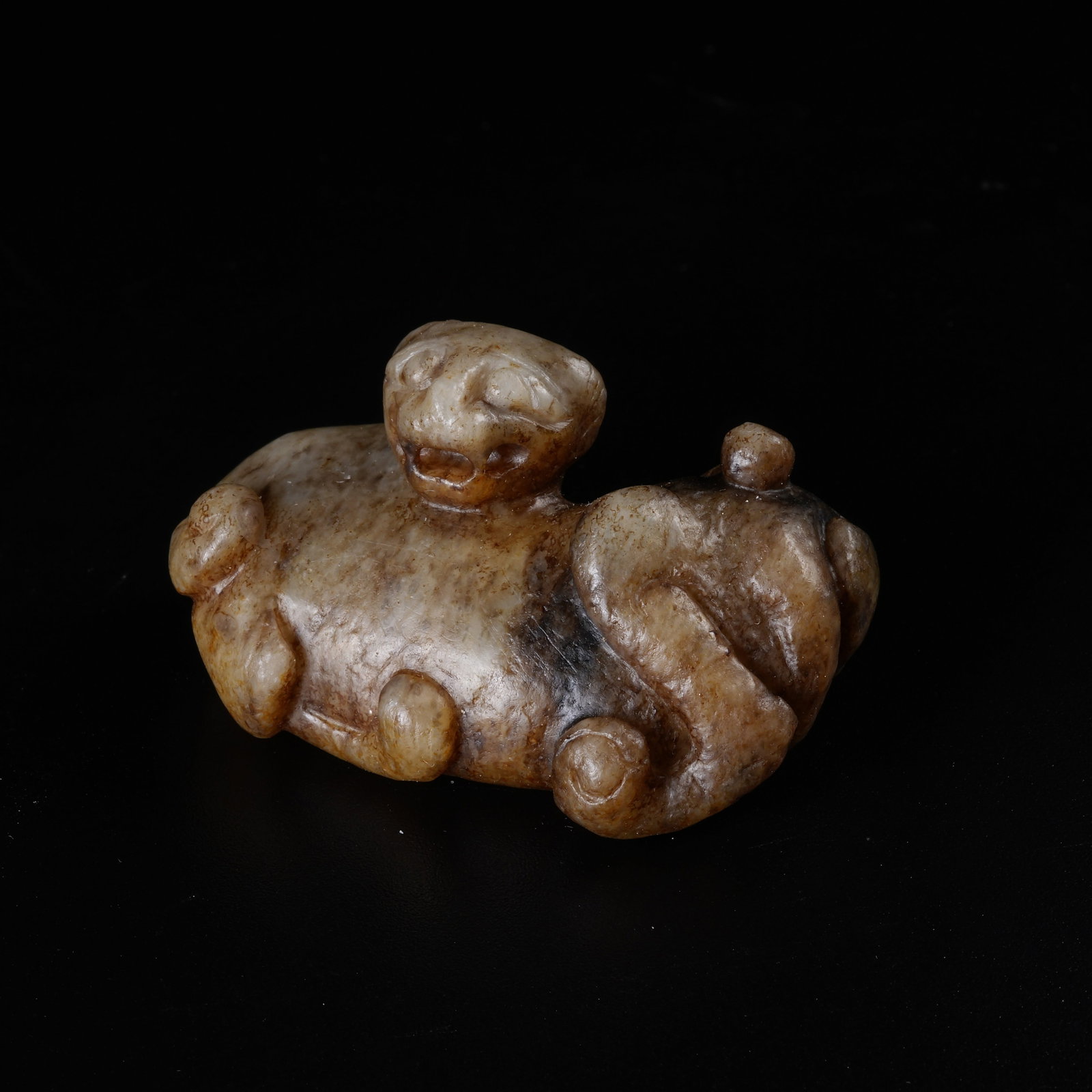A ANCIENT JADE AUSPICIOUS BEAST ORNAMENT: Ancient Jade Auspicious Beast Ornament