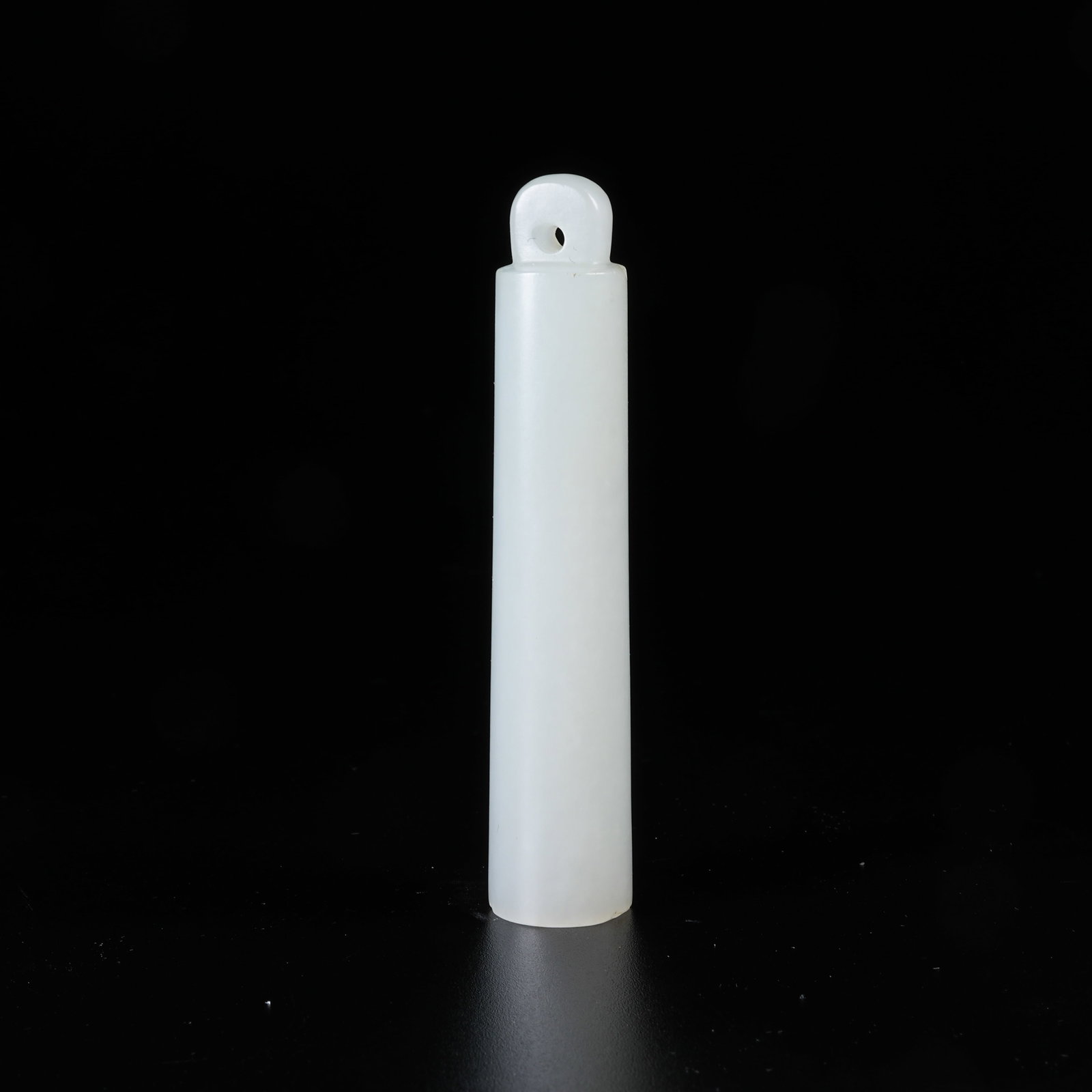 A HETIAN JADE FEATHER TUBE: Hetian Jade Feather Tube