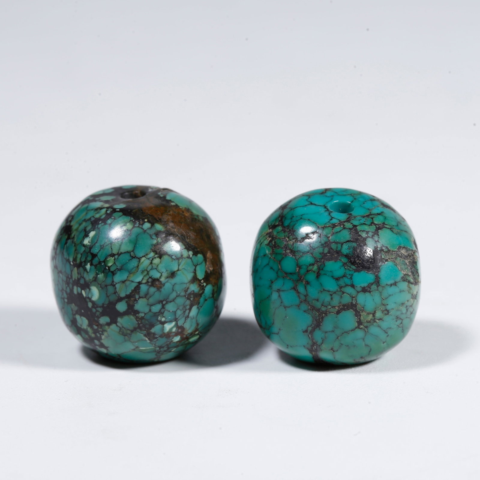A TURQUOISE BEAD (PAIR) (1 of 9)