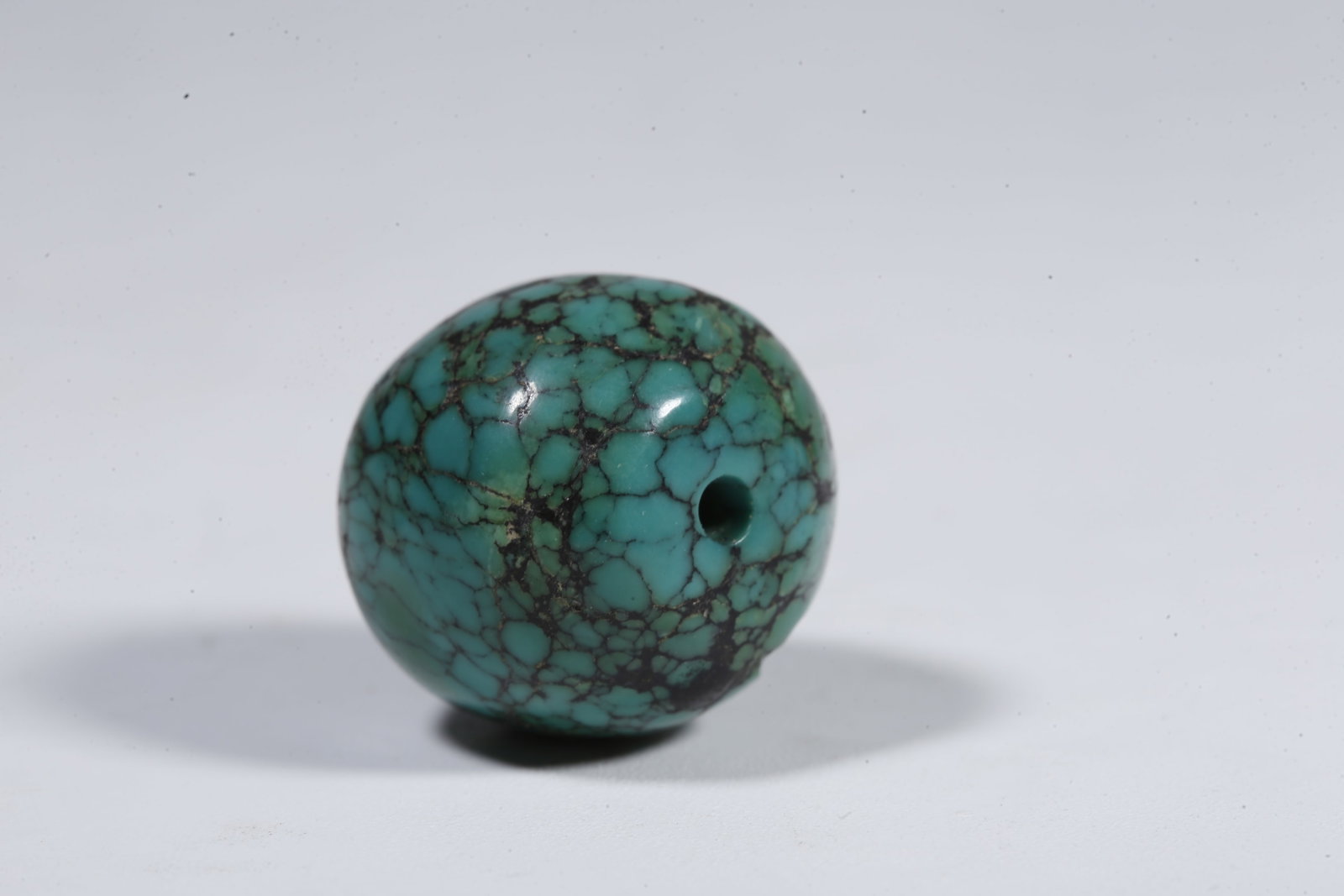A TURQUOISE BEAD (PAIR) - 5