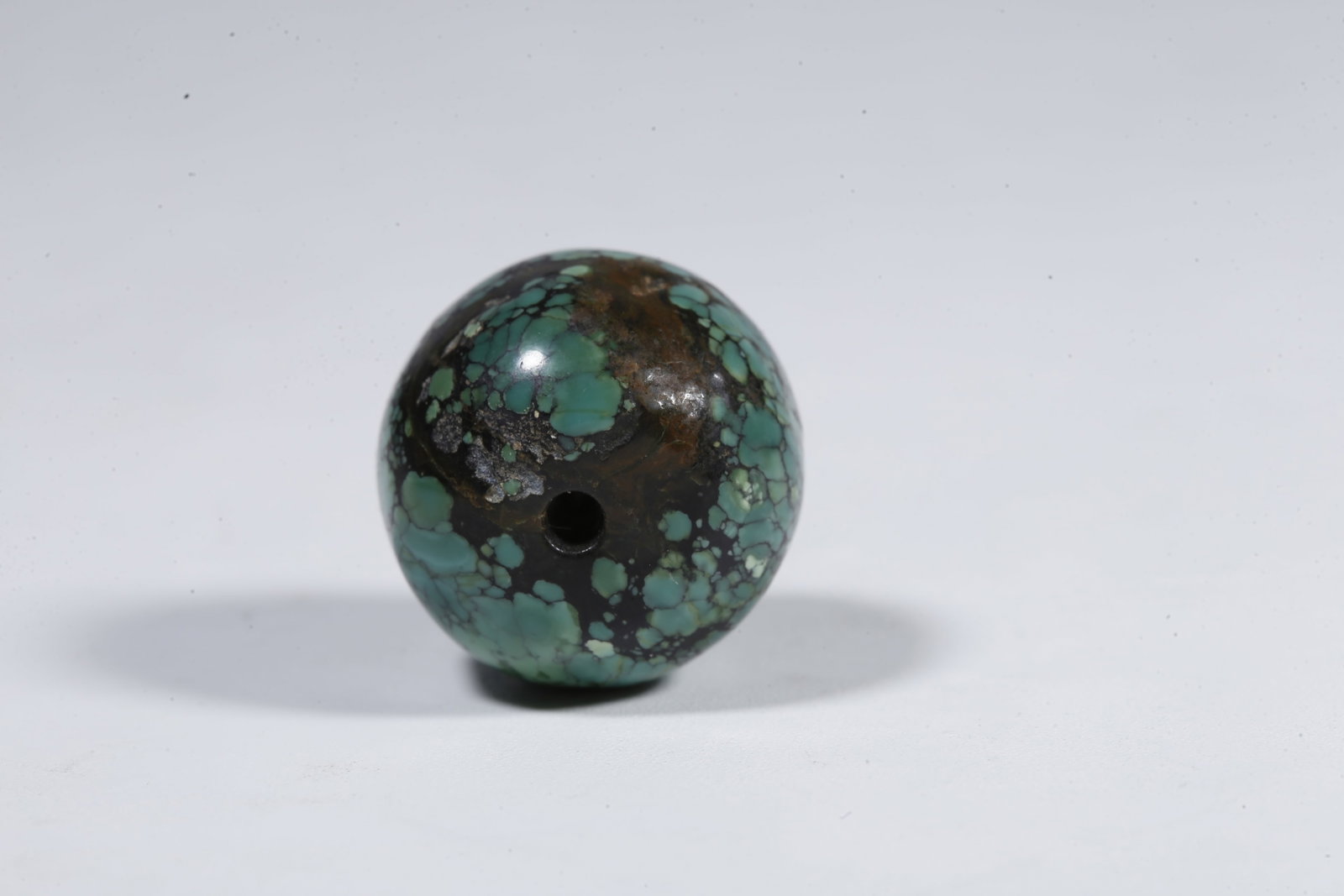 A TURQUOISE BEAD (PAIR) - 9