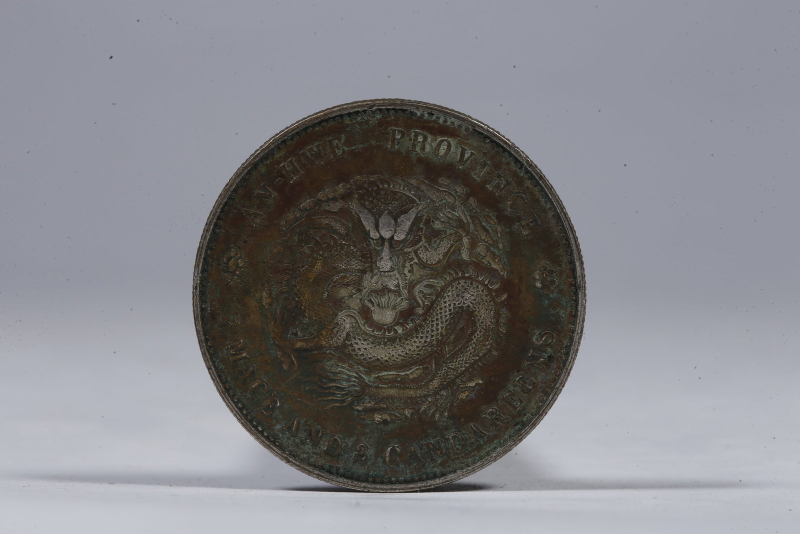 A SILVER DOLLAR COIN - 3