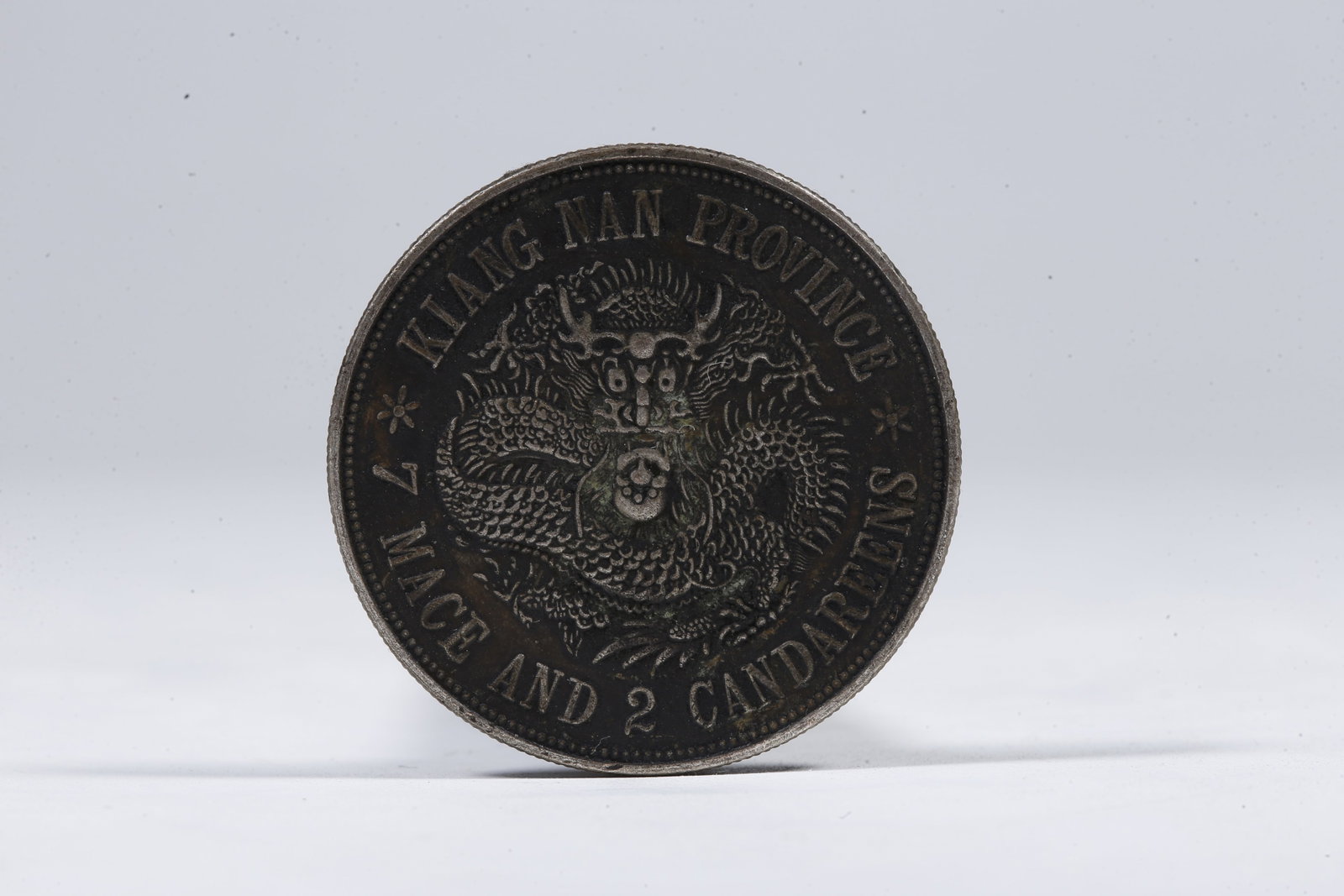A SILVER DOLLAR COIN - 3