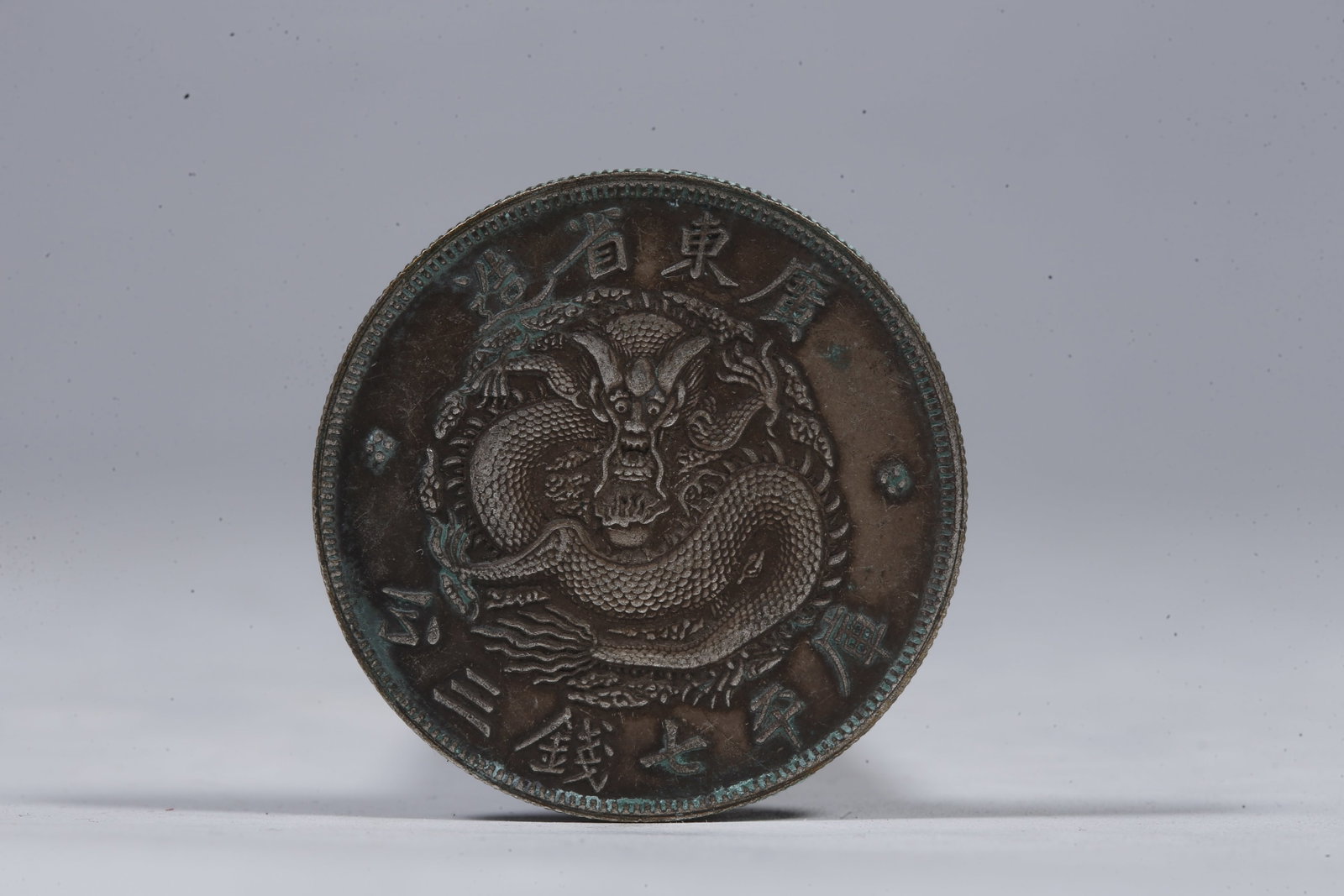 A SILVER DOLLAR COIN - 3