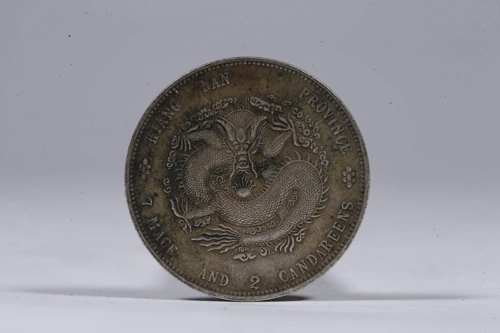 A SILVER DOLLAR COIN - 3