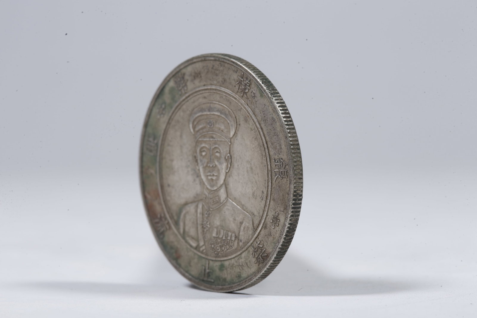 A SILVER DOLLAR COIN - 2