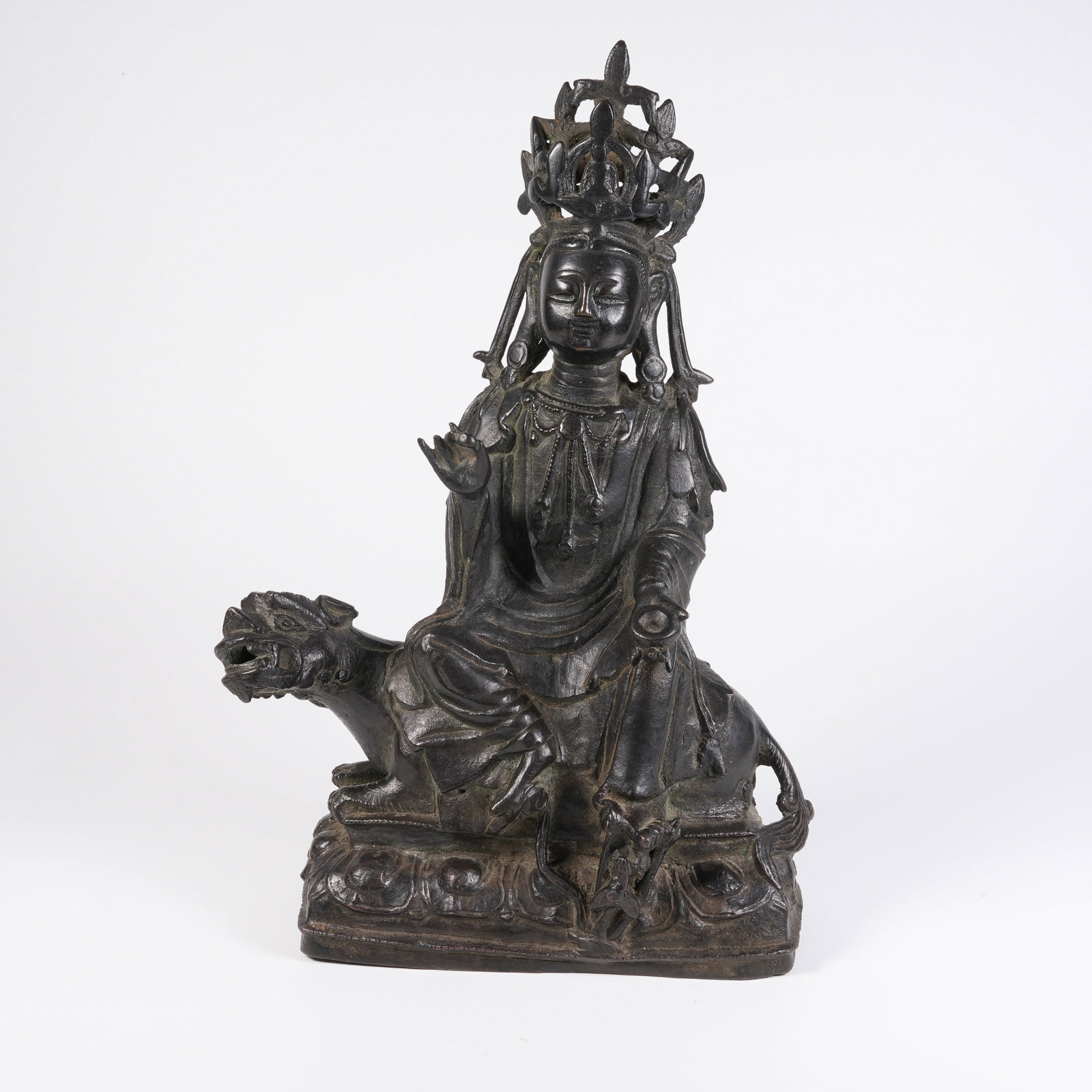 A BRONZE STATUE OF SIMHANADA AVALOKITESVARA: Bronze Statue of Simhanada Avalokitesvara