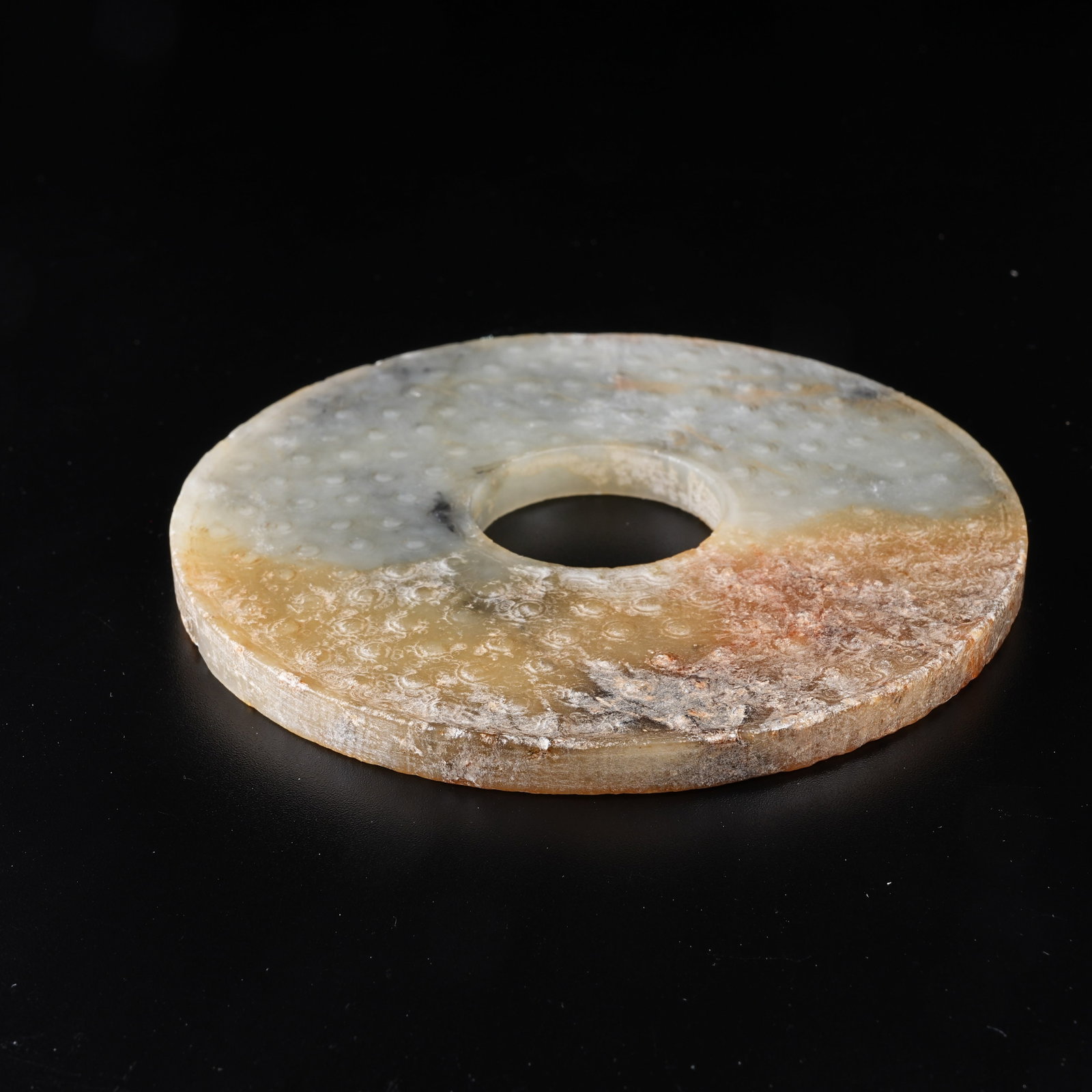 A ARCHAIC JADE BI WITH STUD PATTERN - 10