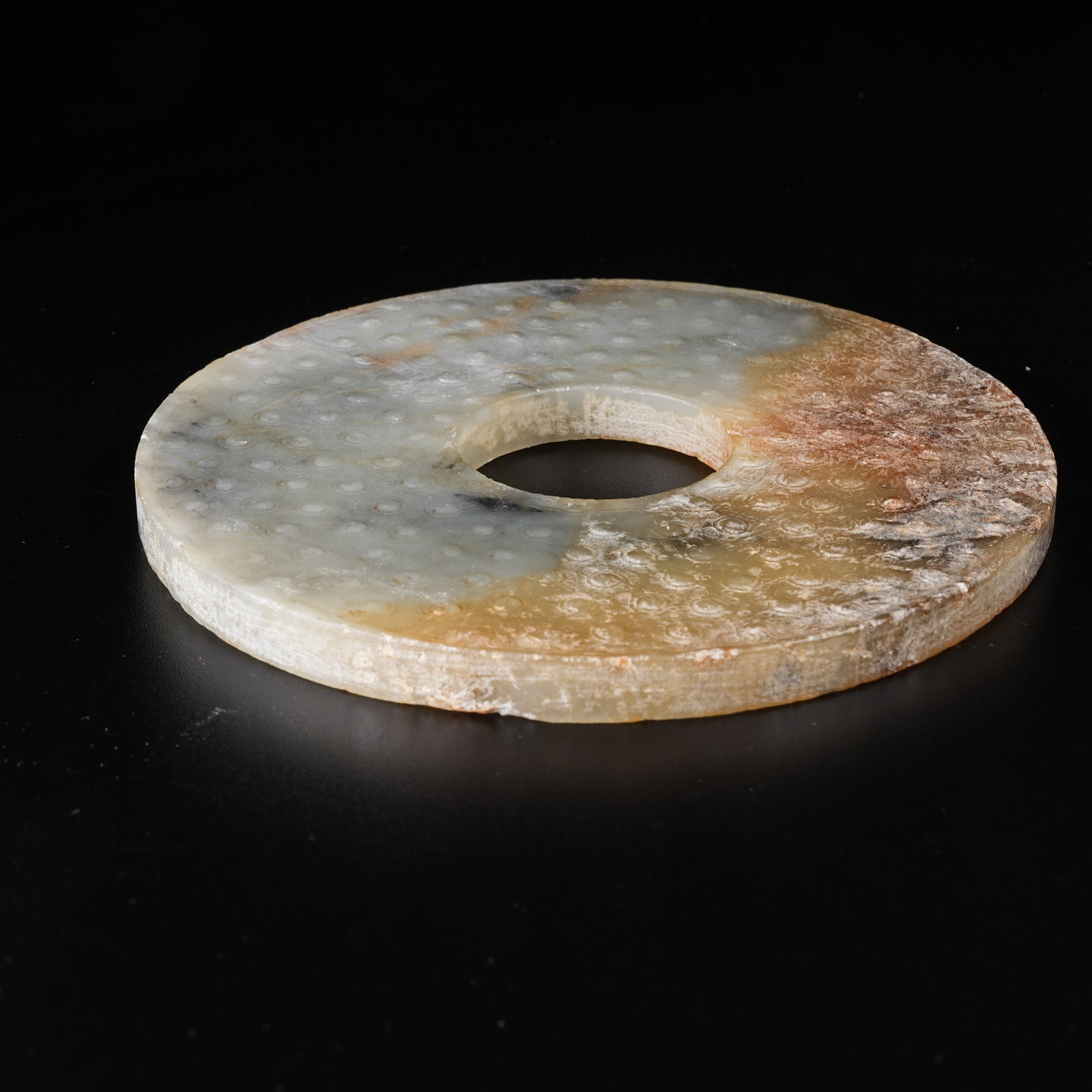 A ARCHAIC JADE BI WITH STUD PATTERN - 8