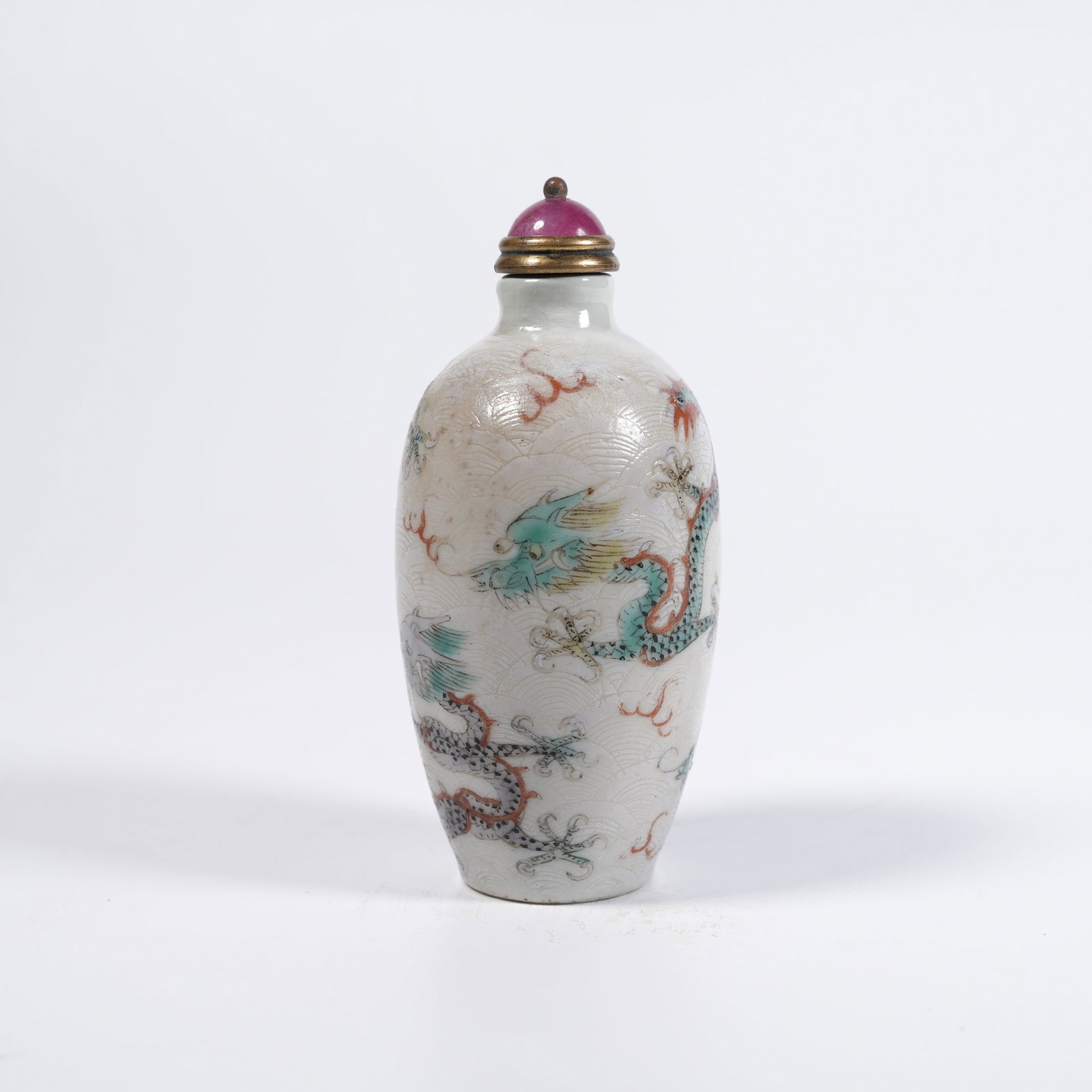 A FAMILLE-ROSE SNUFF BOTTLE WITH SEAWATER-DRAGON PATTERN (1 of 9)