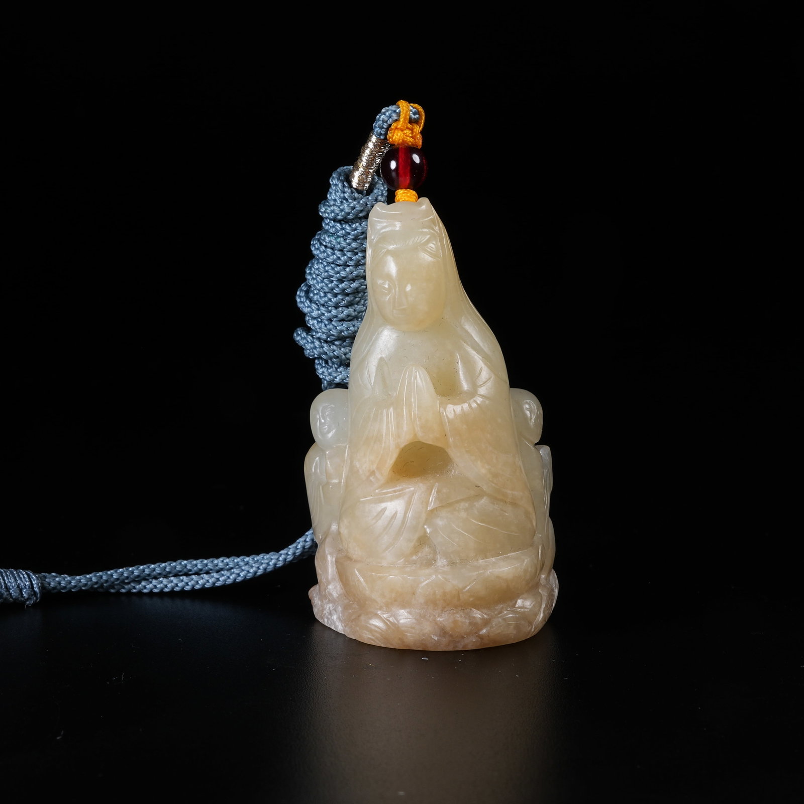 A HETIAN JADE PENDANT OF GUANYIN WITH BOY ATTENDANT: Hetian Jade Pendant of Guanyin with Boy Attendant
