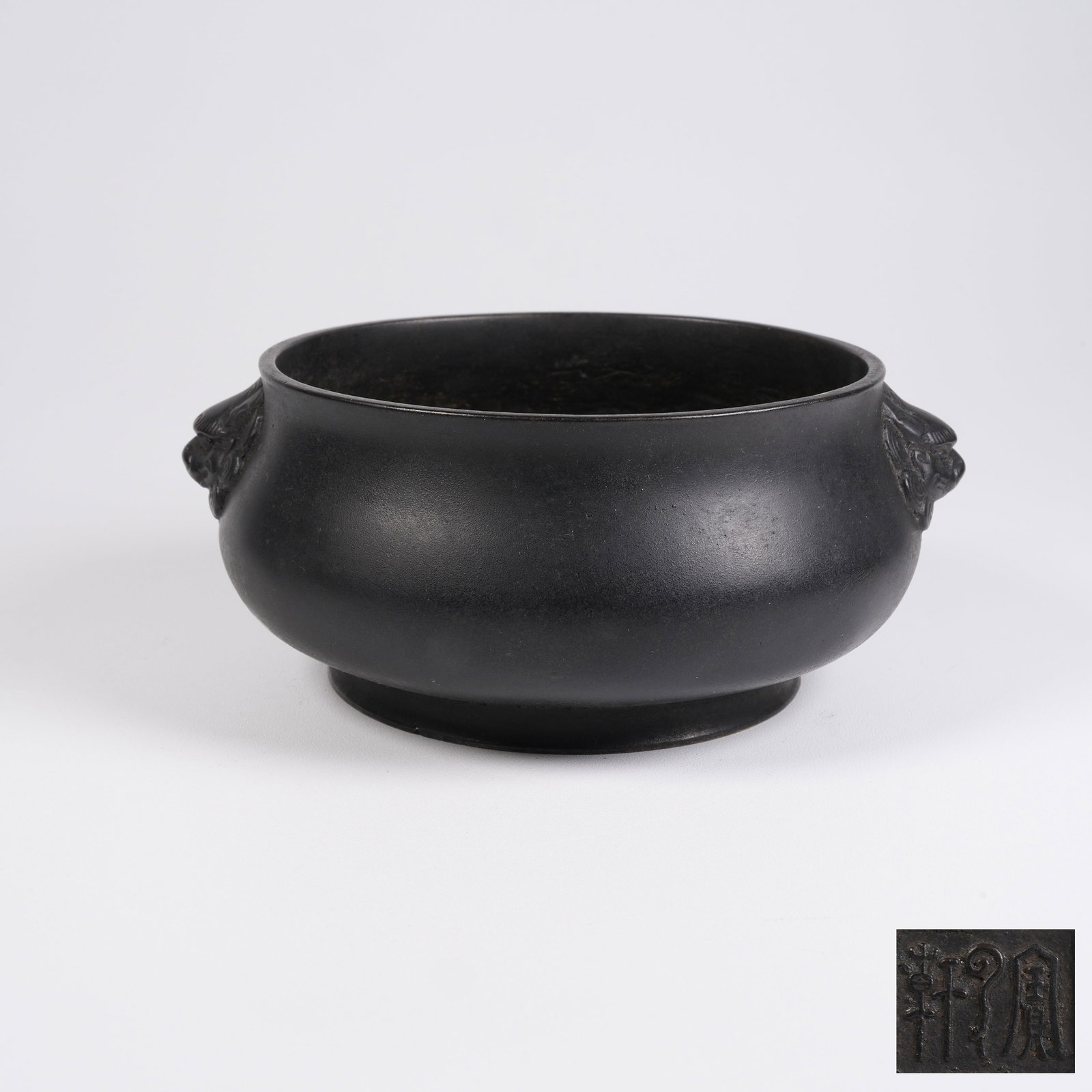 A BRONZE CENSER WITH LION-SHAPED EARS (1 of 9)